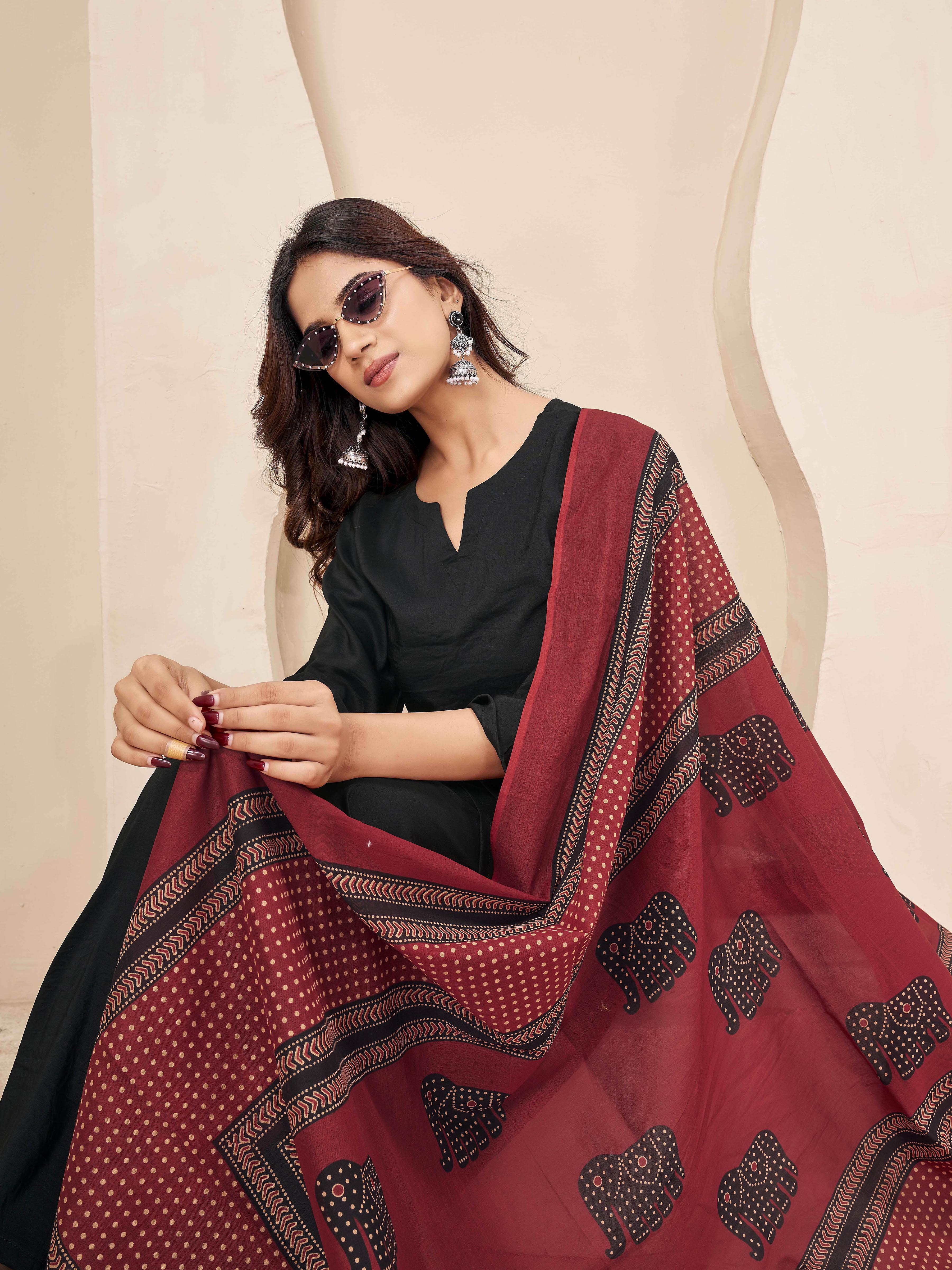 Black color silk blend solid kurta & a-line plazzo with printed dupatta set