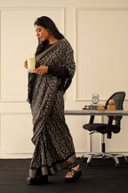 Black colored poly cotton ready to wear saree