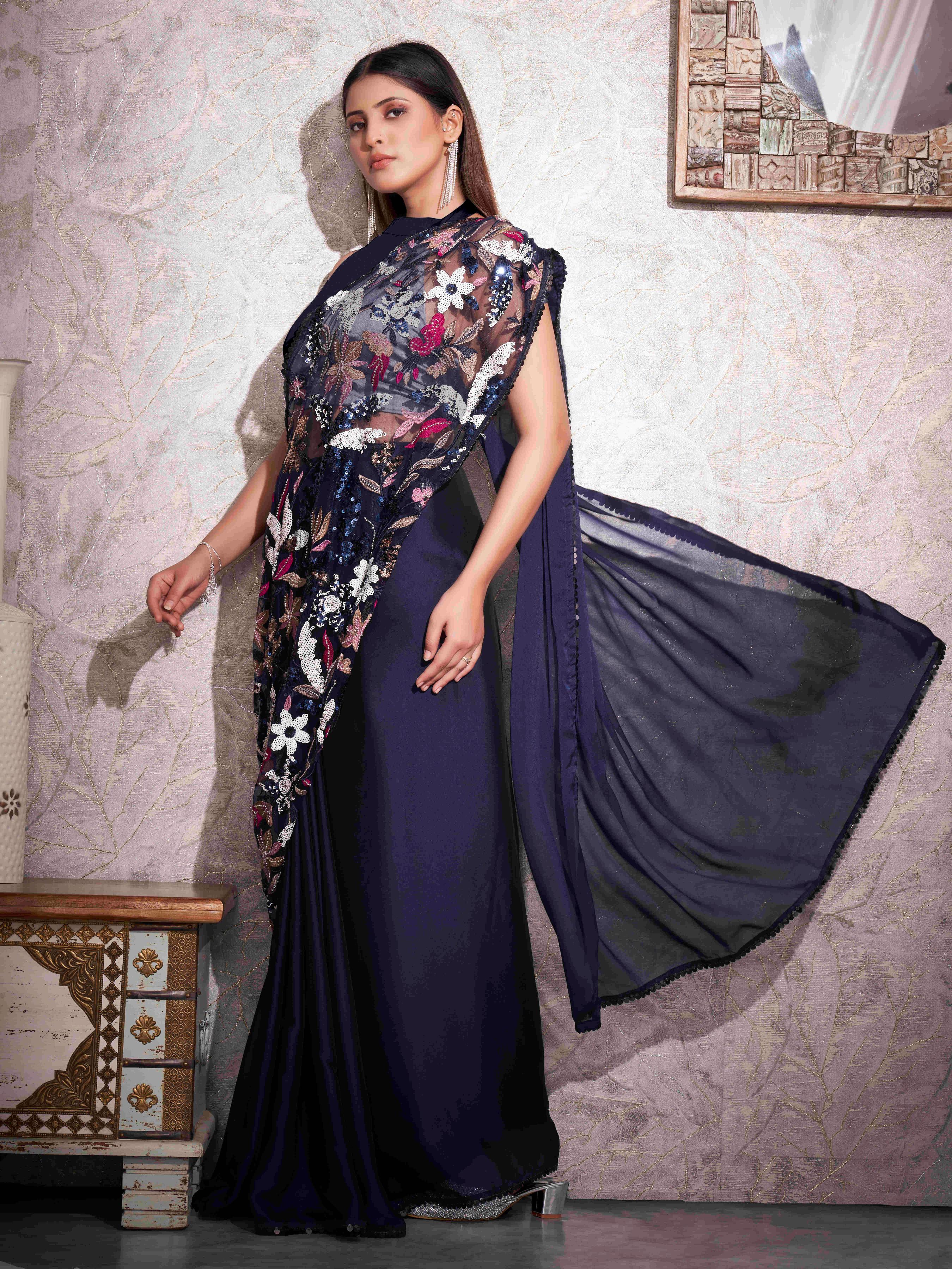 Blue colored designer saree with heavy embroidery on shoulder portion