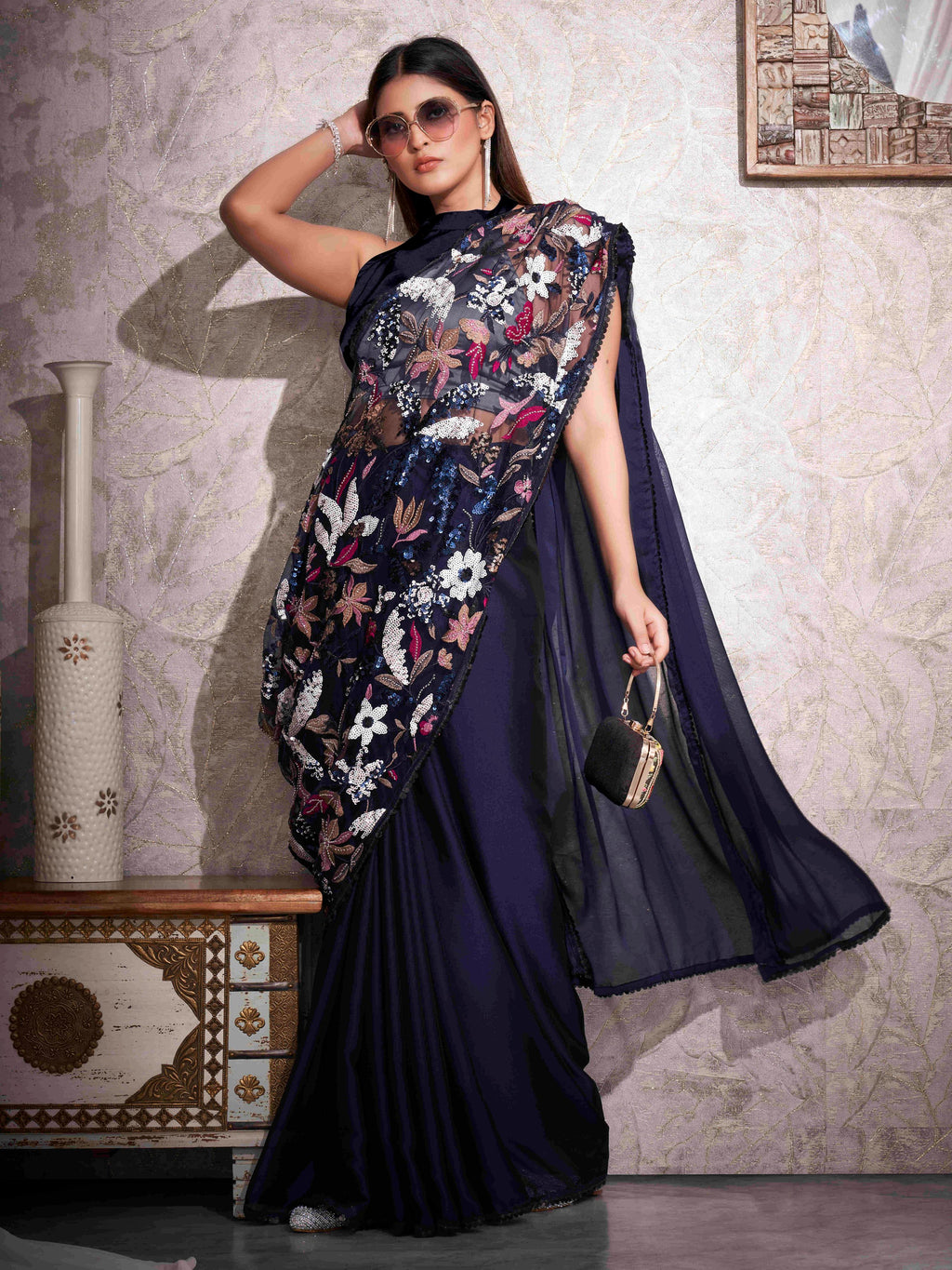 Blue colored designer saree with heavy embroidery on shoulder portion