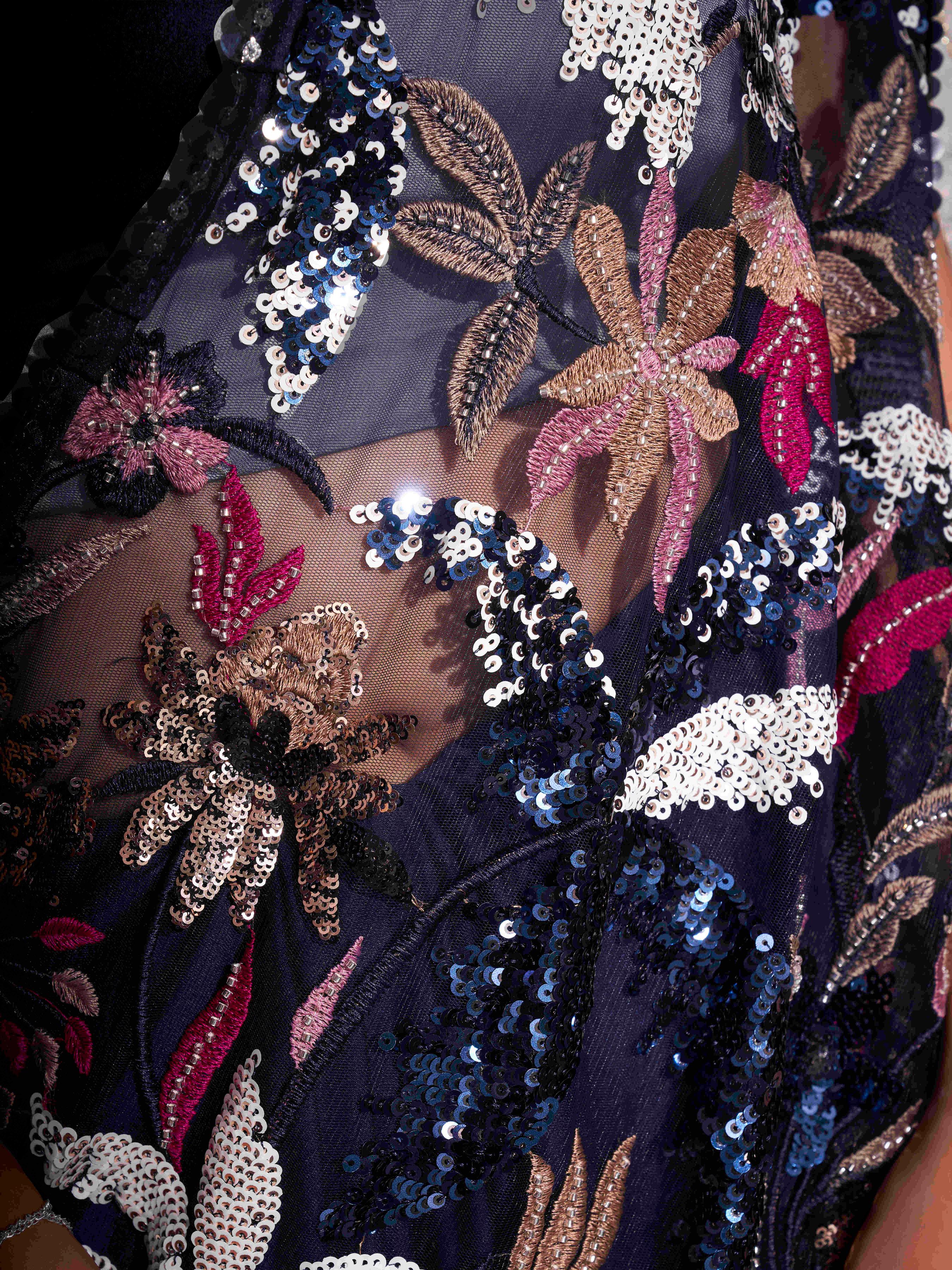 Blue colored designer saree with heavy embroidery on shoulder portion