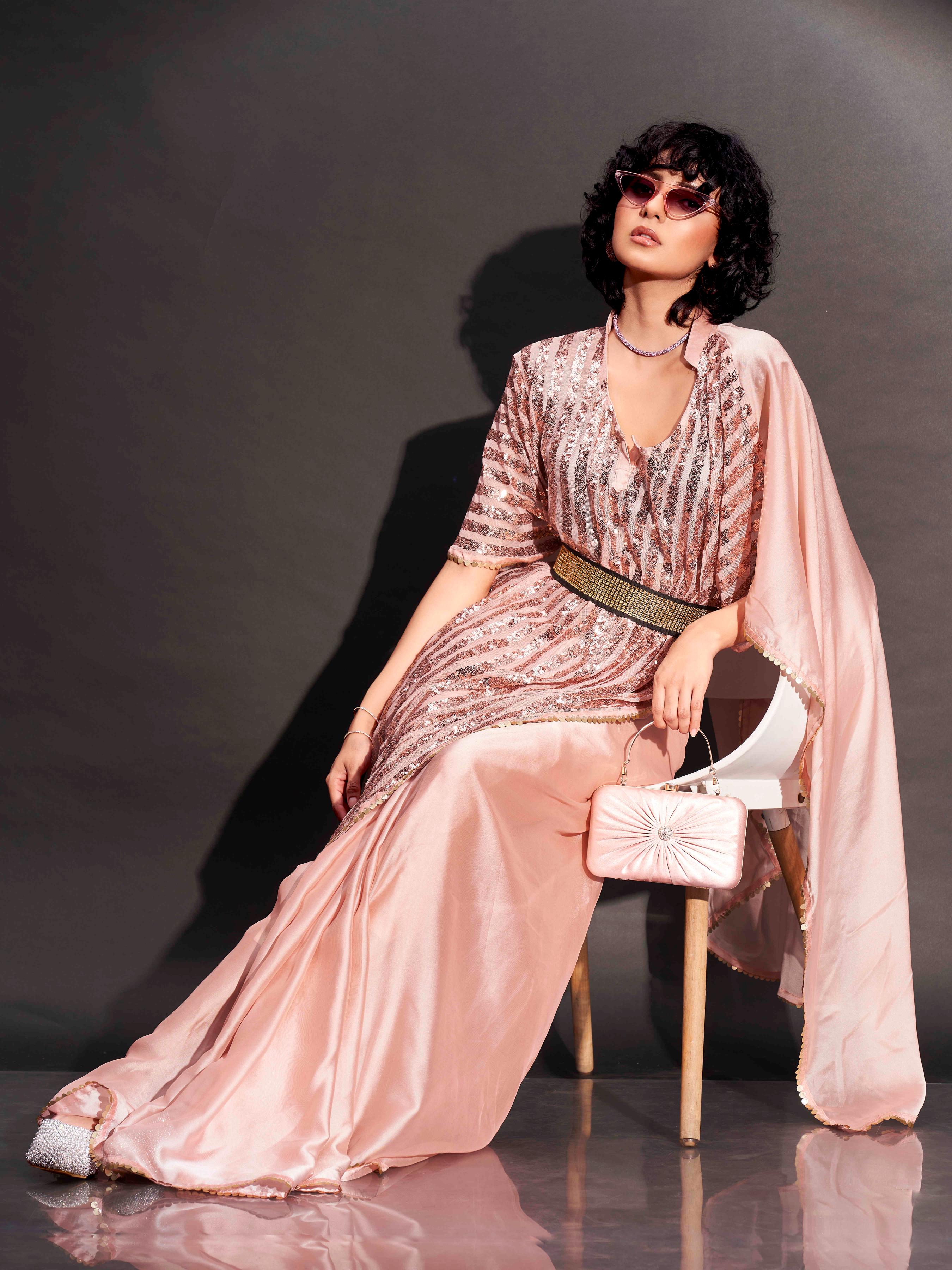 Peach colored designer sequinned kaftan saree with belt and embellished border