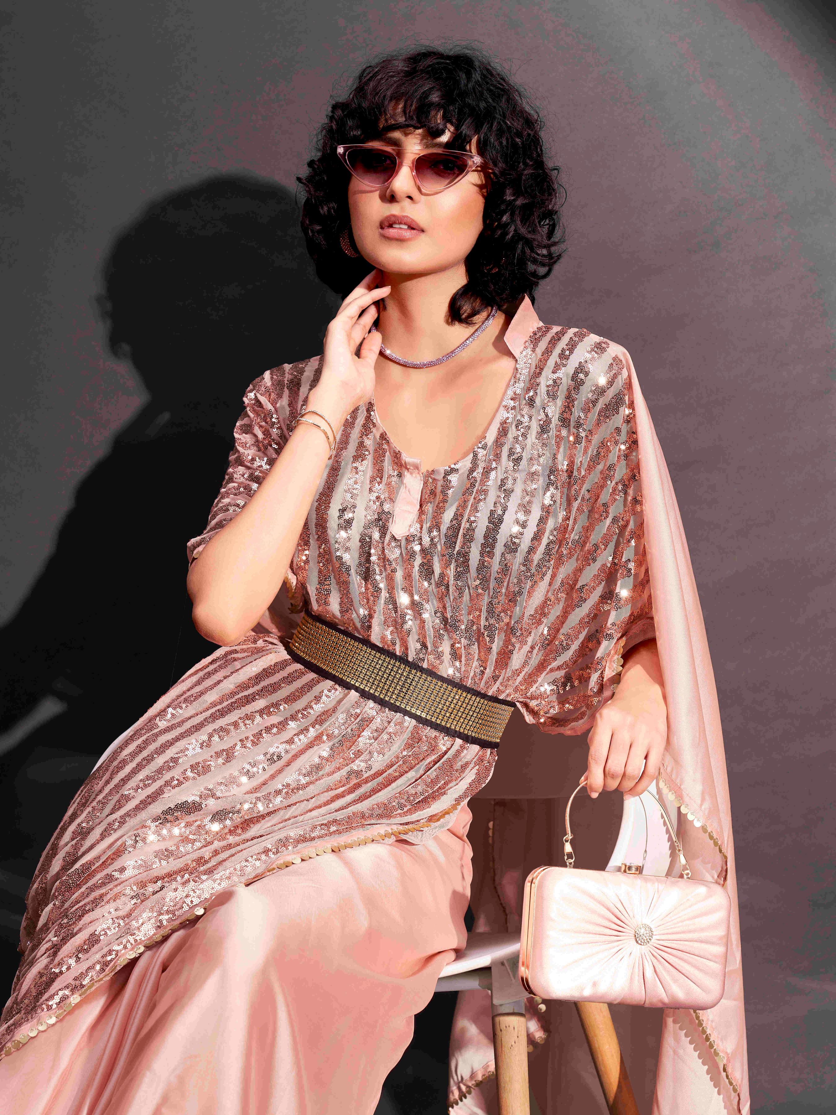 Peach colored designer sequinned kaftan saree with belt and embellished border