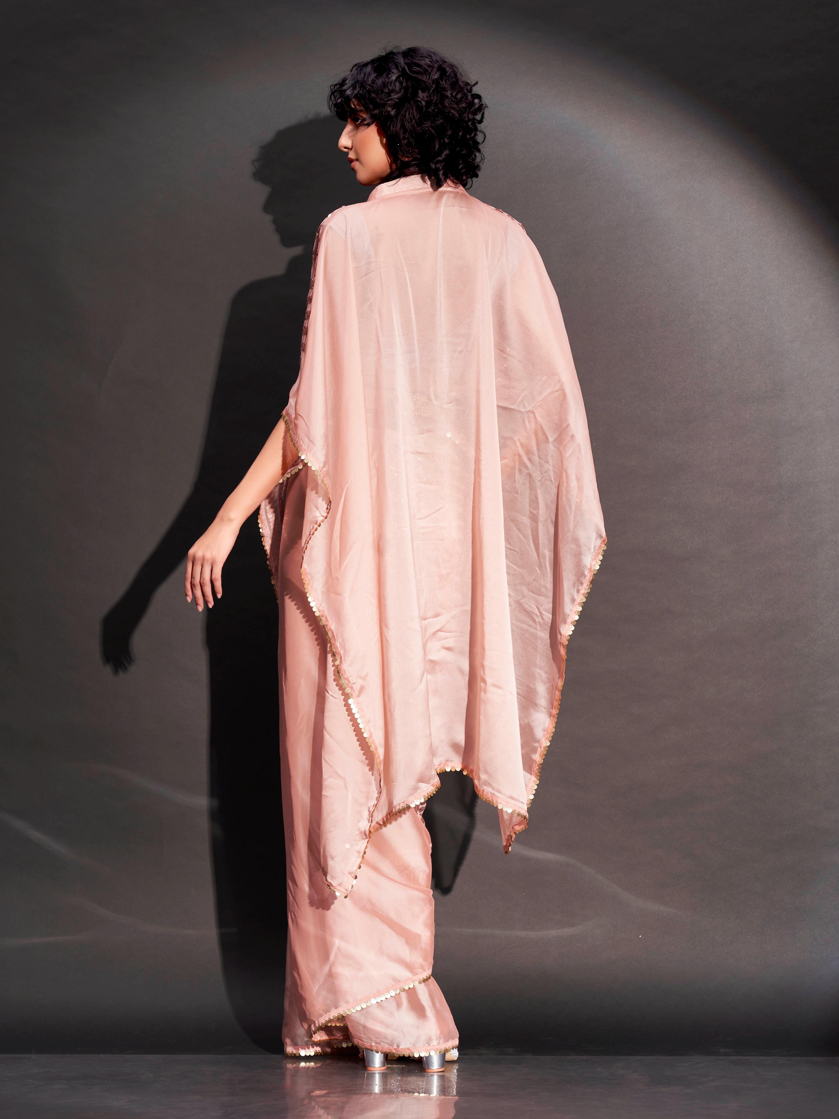 Peach colored designer sequinned kaftan saree with belt and embellished border