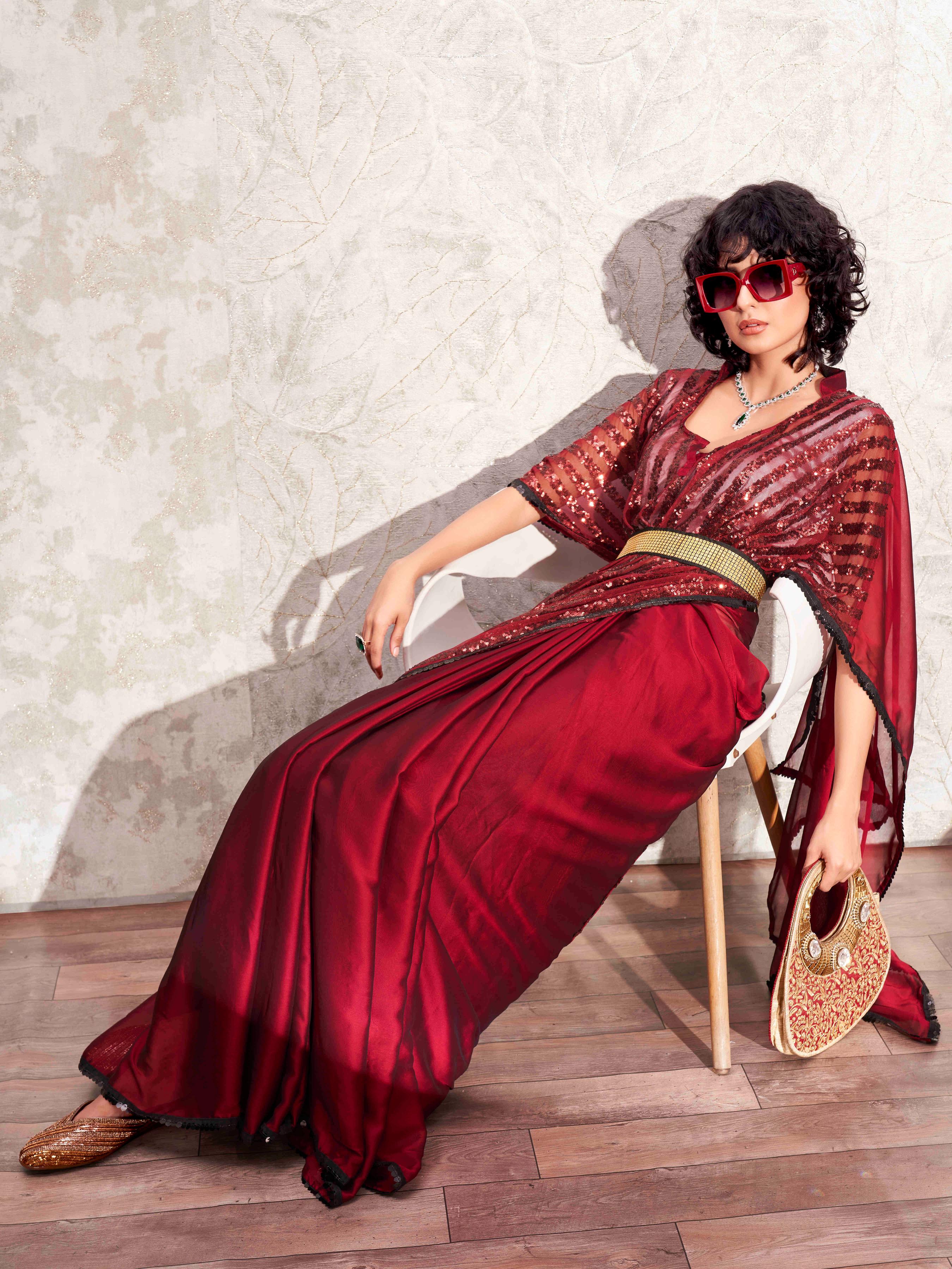 Maroon colored designer sequinned kaftan saree with belt and embellished border