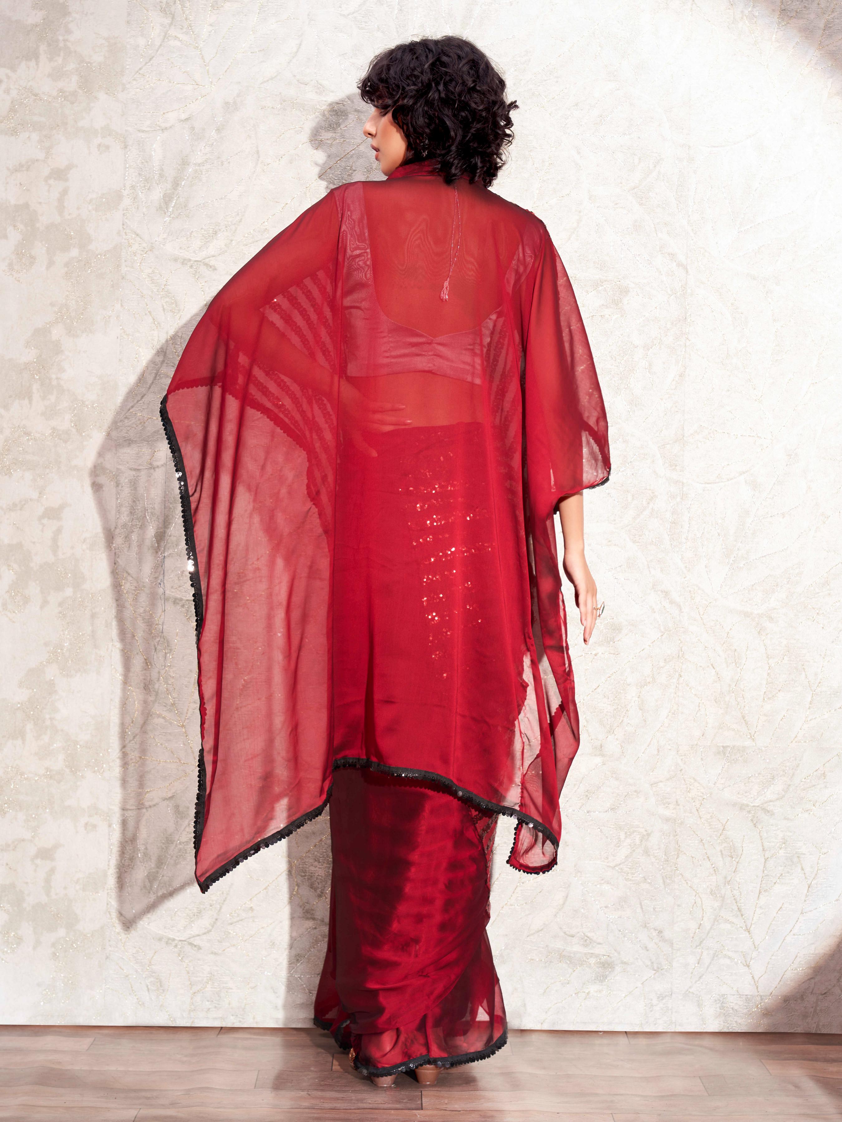 Maroon colored designer sequinned kaftan saree with belt and embellished border