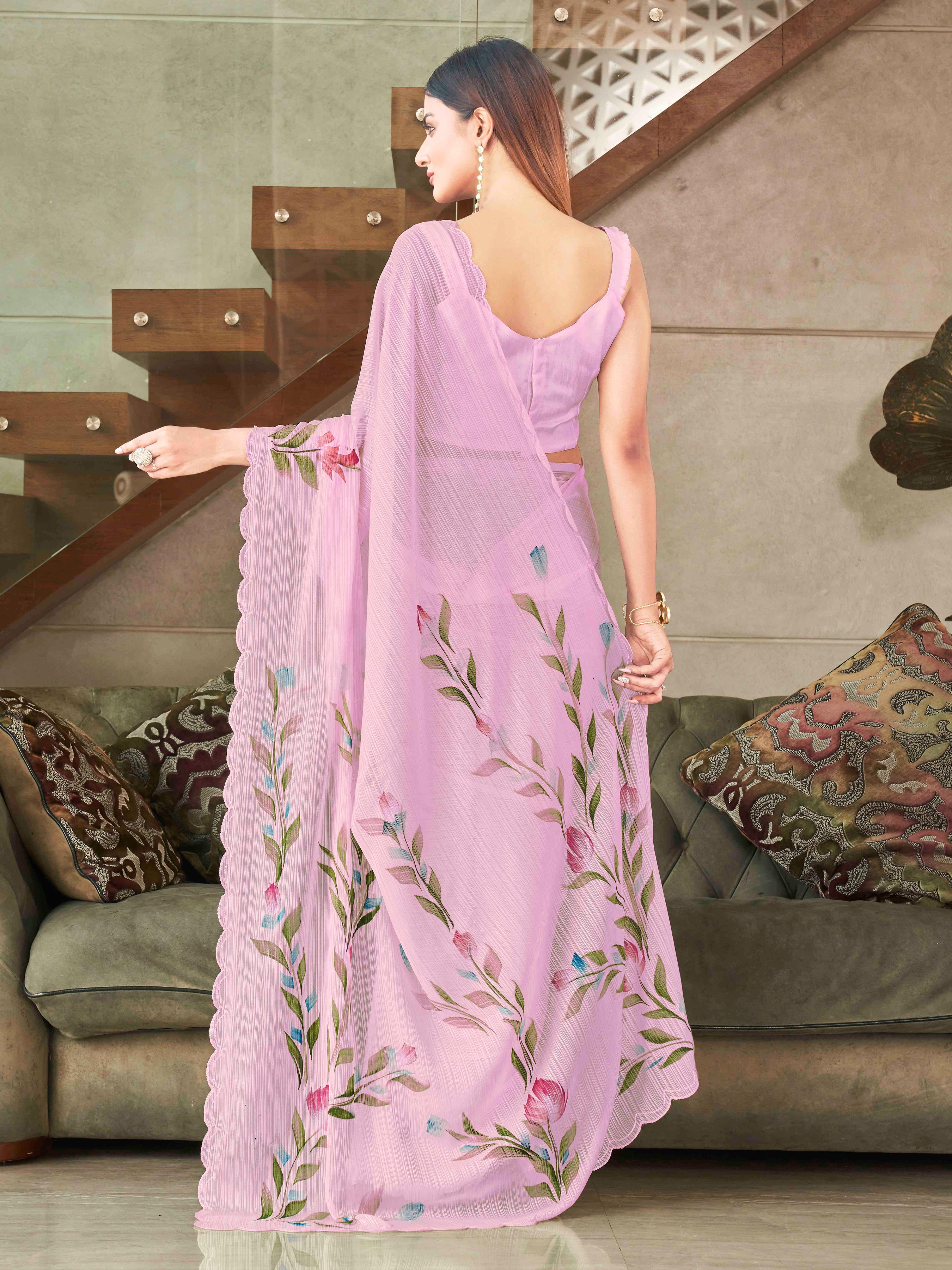 Pink colored striped shimmer saree with floral hand print and scalloped border