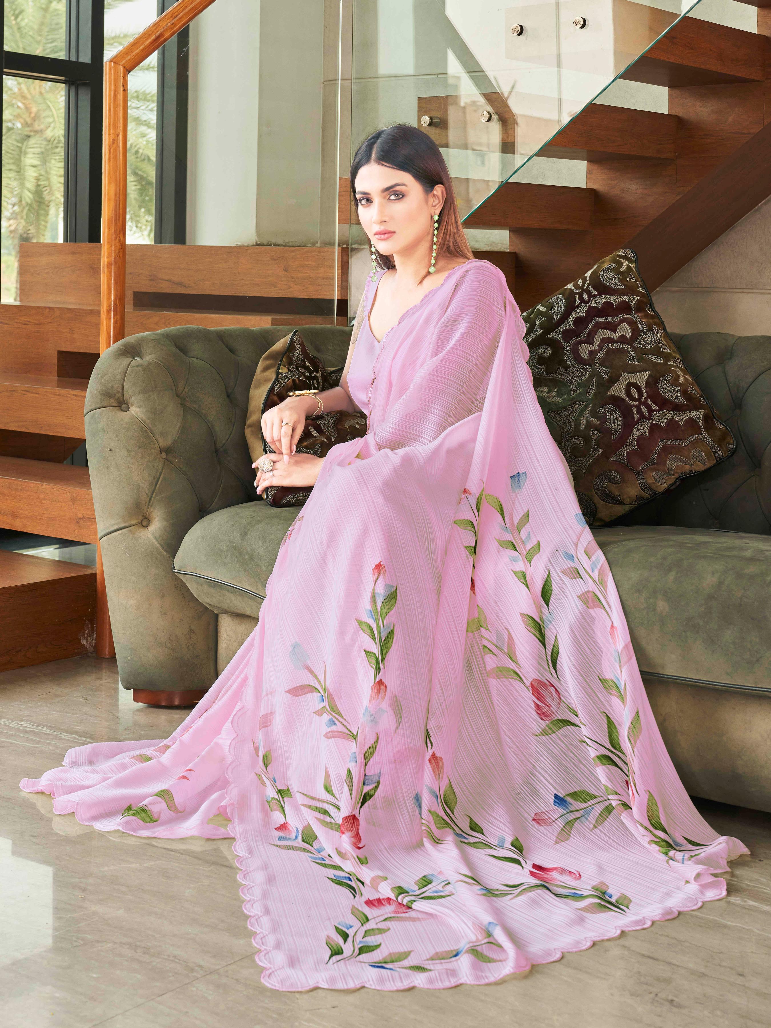 Pink colored striped shimmer saree with floral hand print and scalloped border