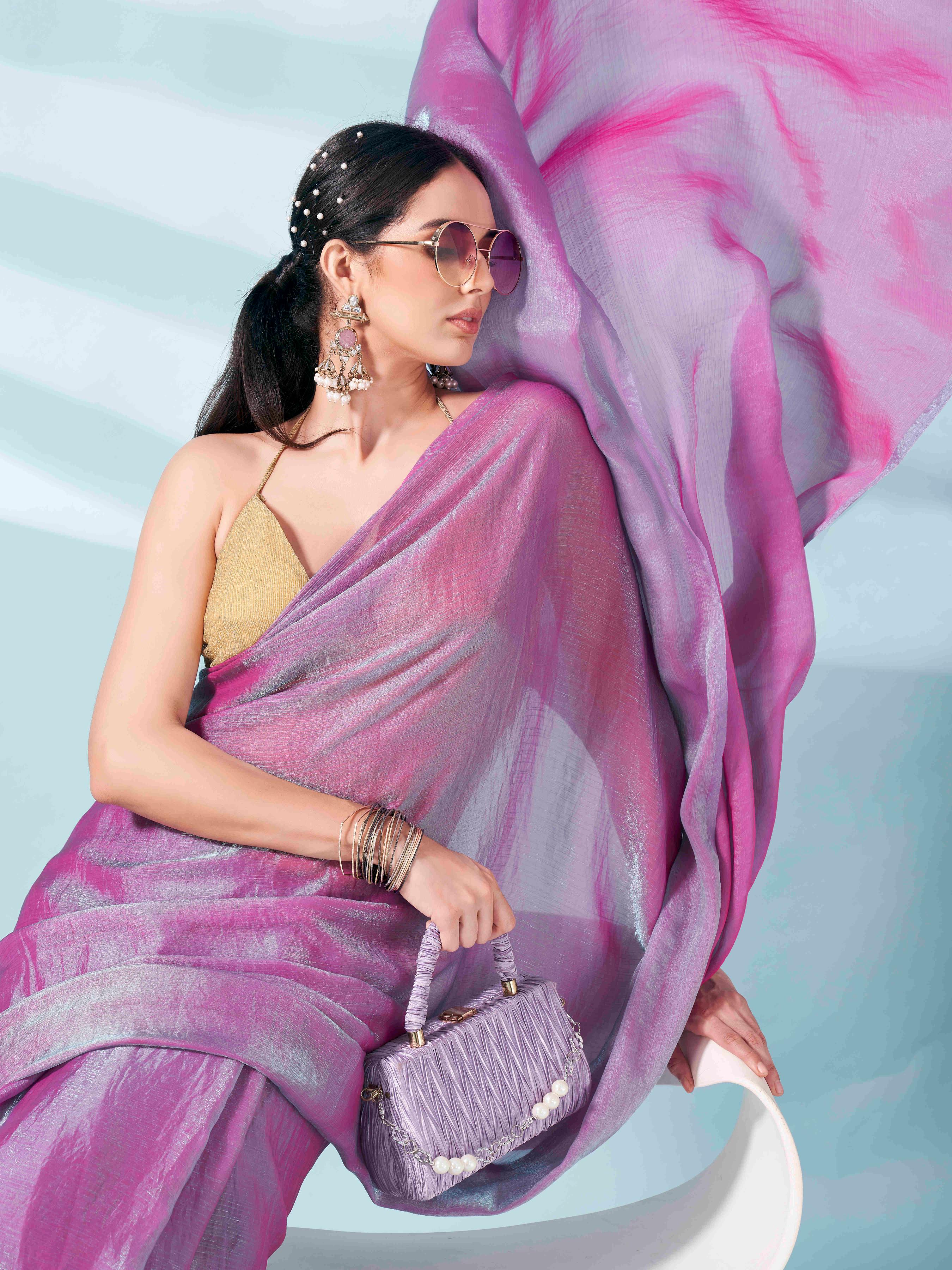 Pink and blue two tone shimmer chiffon saree with tassles in pallu and fancy lycra blouse