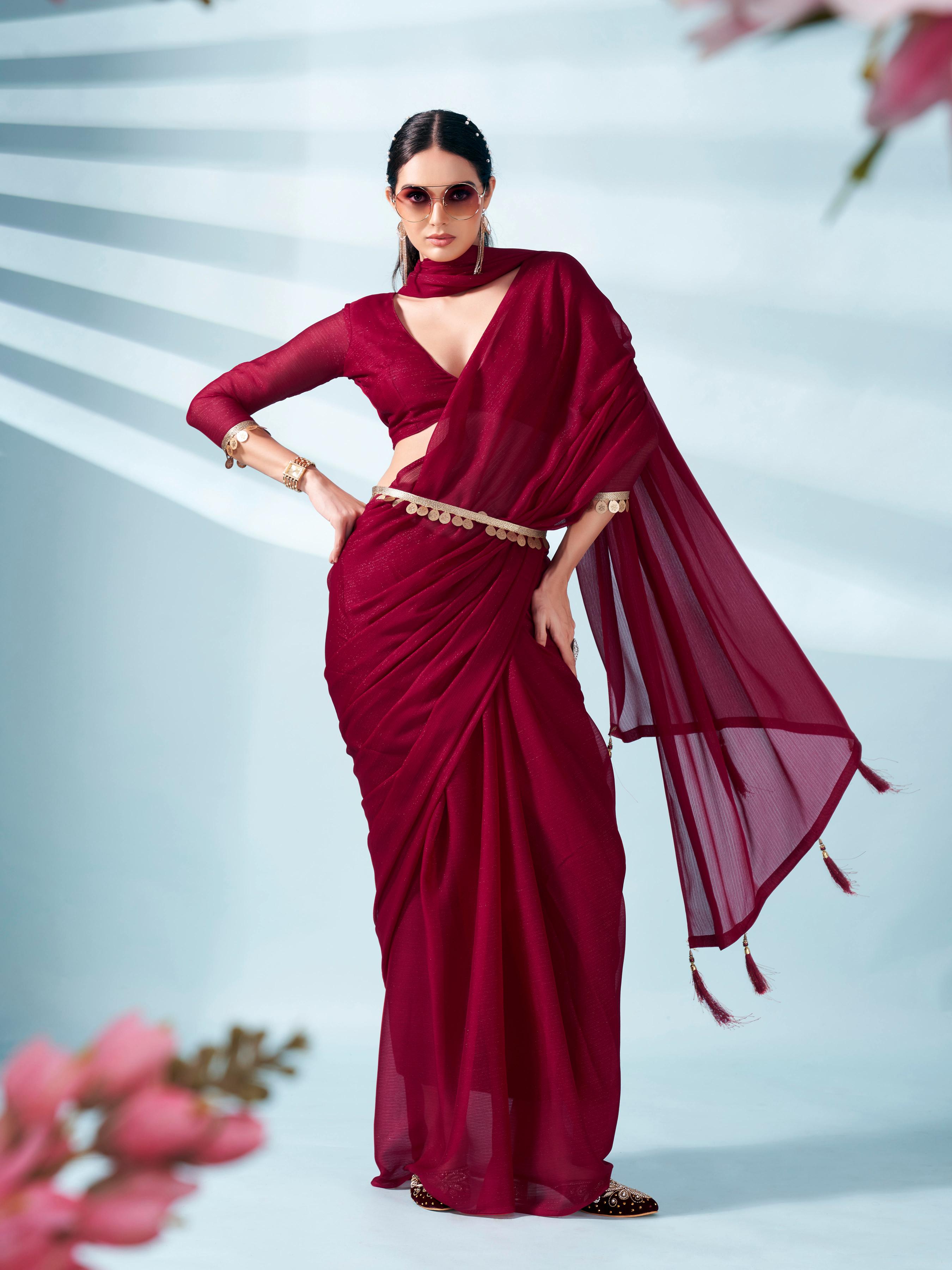 Maroon colored zari weaving satin saree with sequinned belt