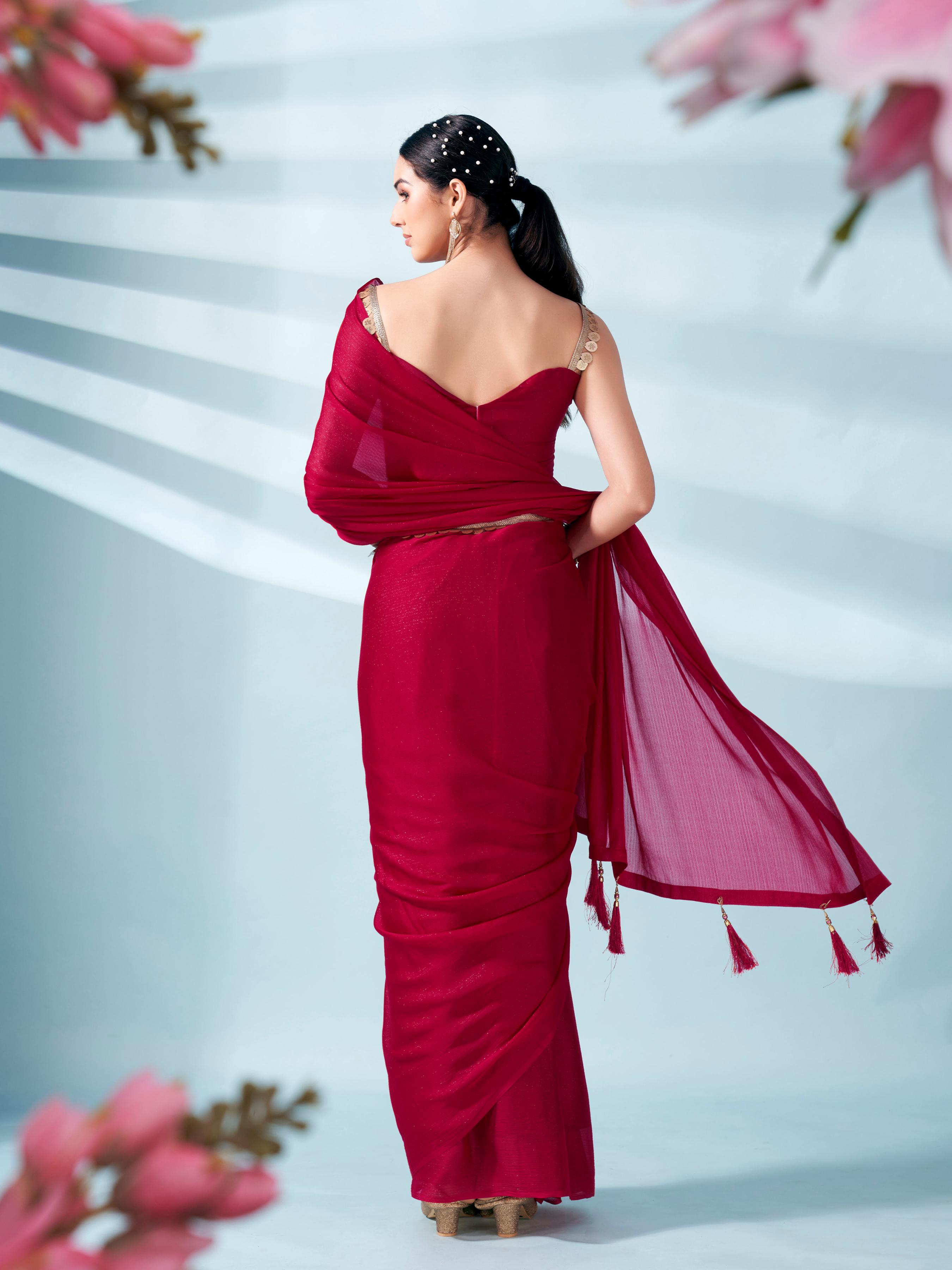 Pink colored zari weaving satin saree with sequinned belt