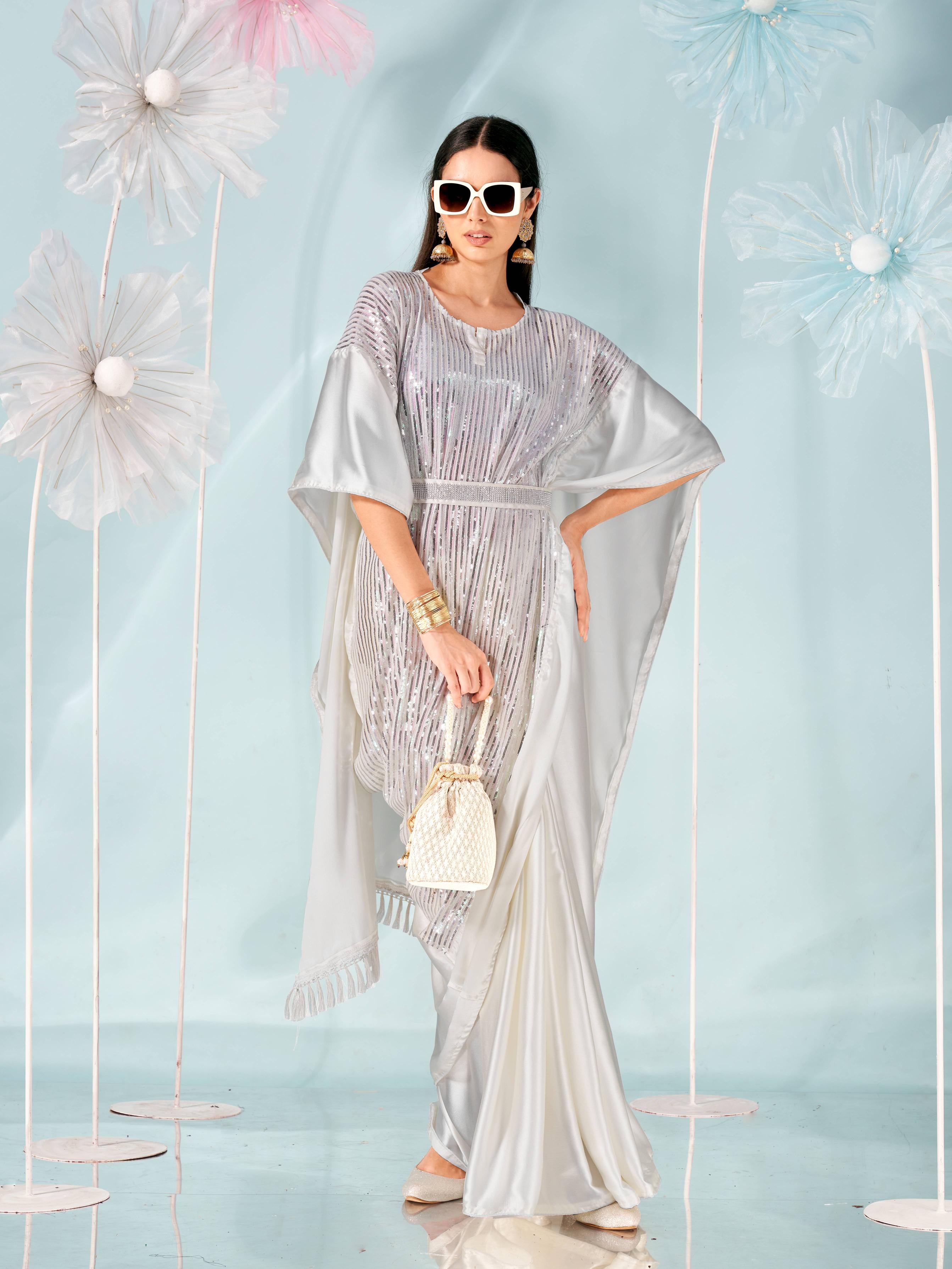 Off white colored designer sequinned kaaftan saree with embellished belt