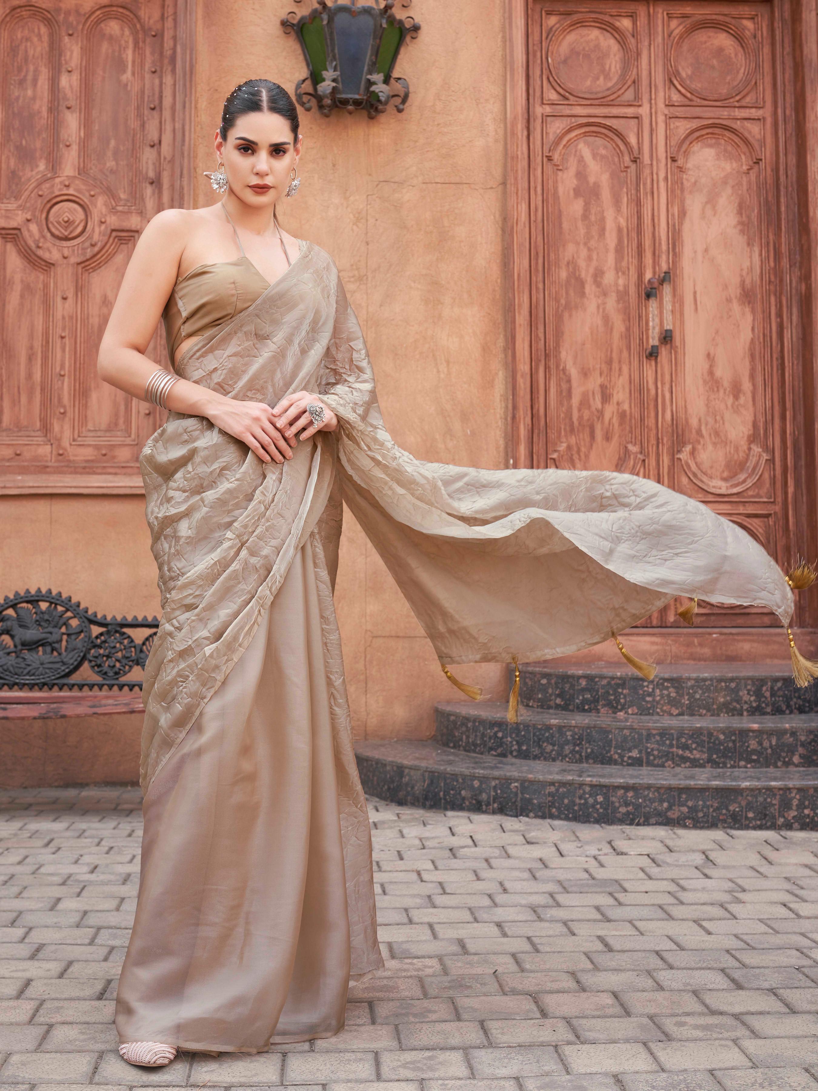 Beige colored crushed pallu burbery organza half and half saree