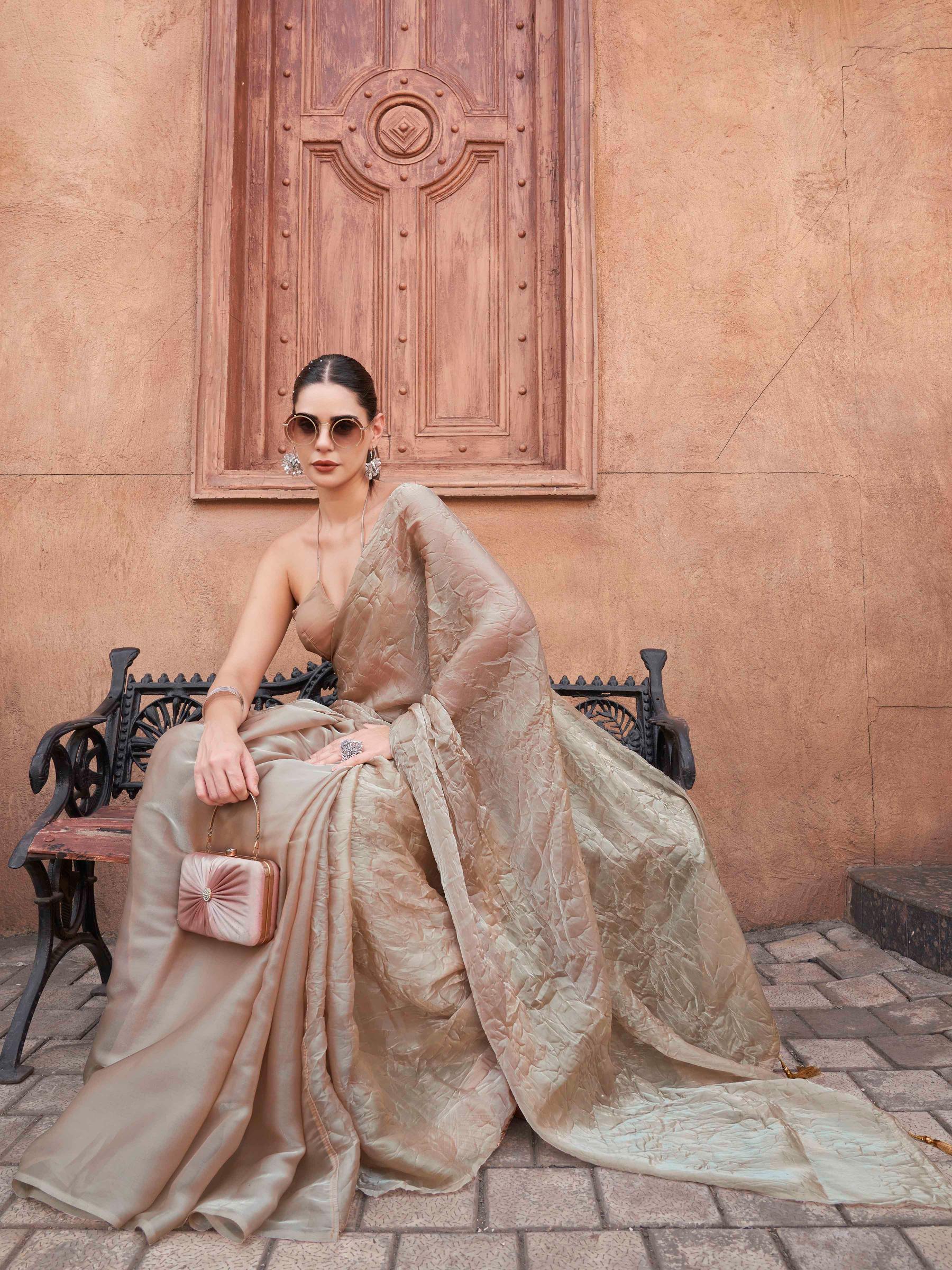 Beige colored crushed pallu burbery organza half and half saree