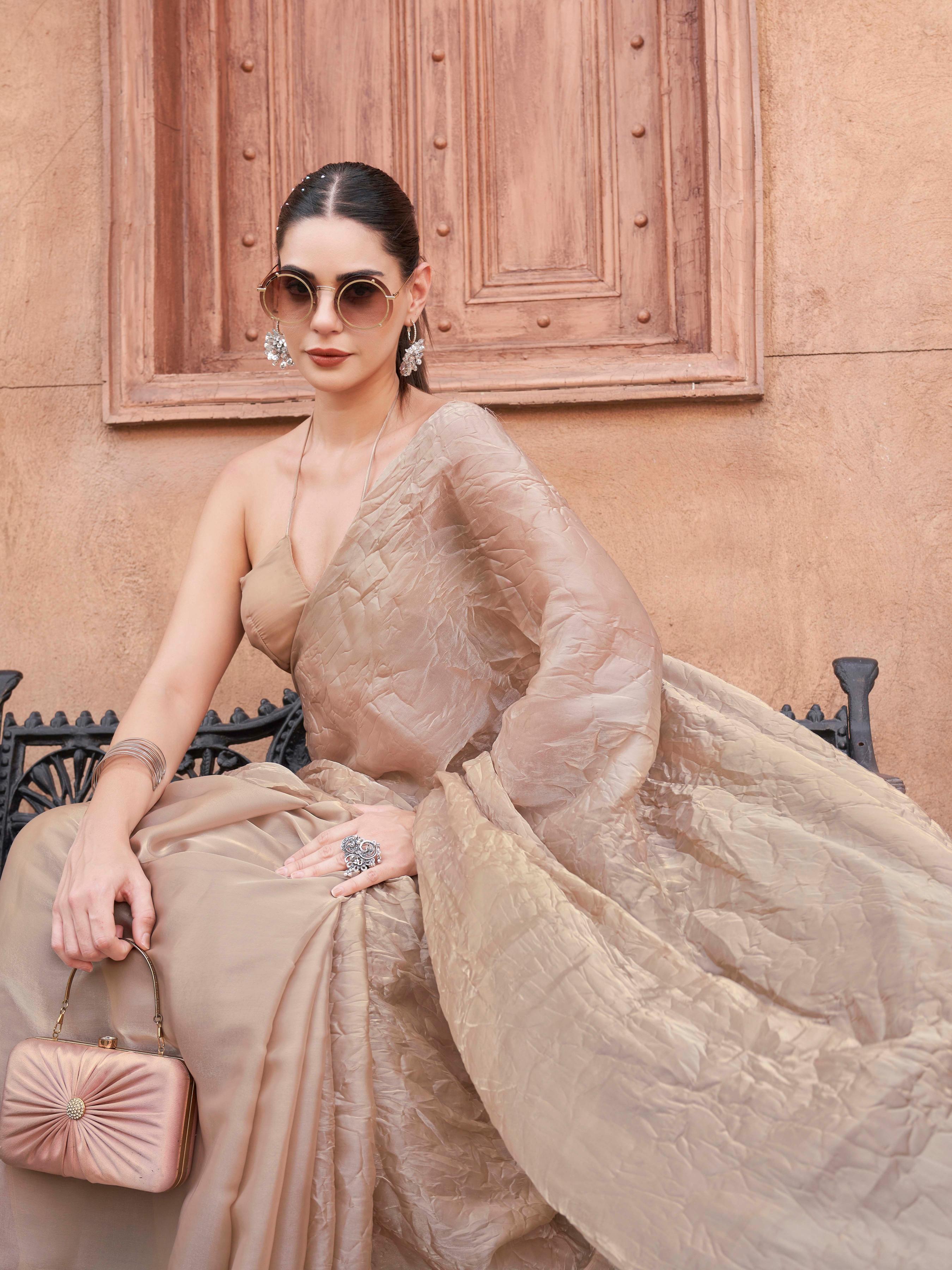 Beige colored crushed pallu burbery organza half and half saree