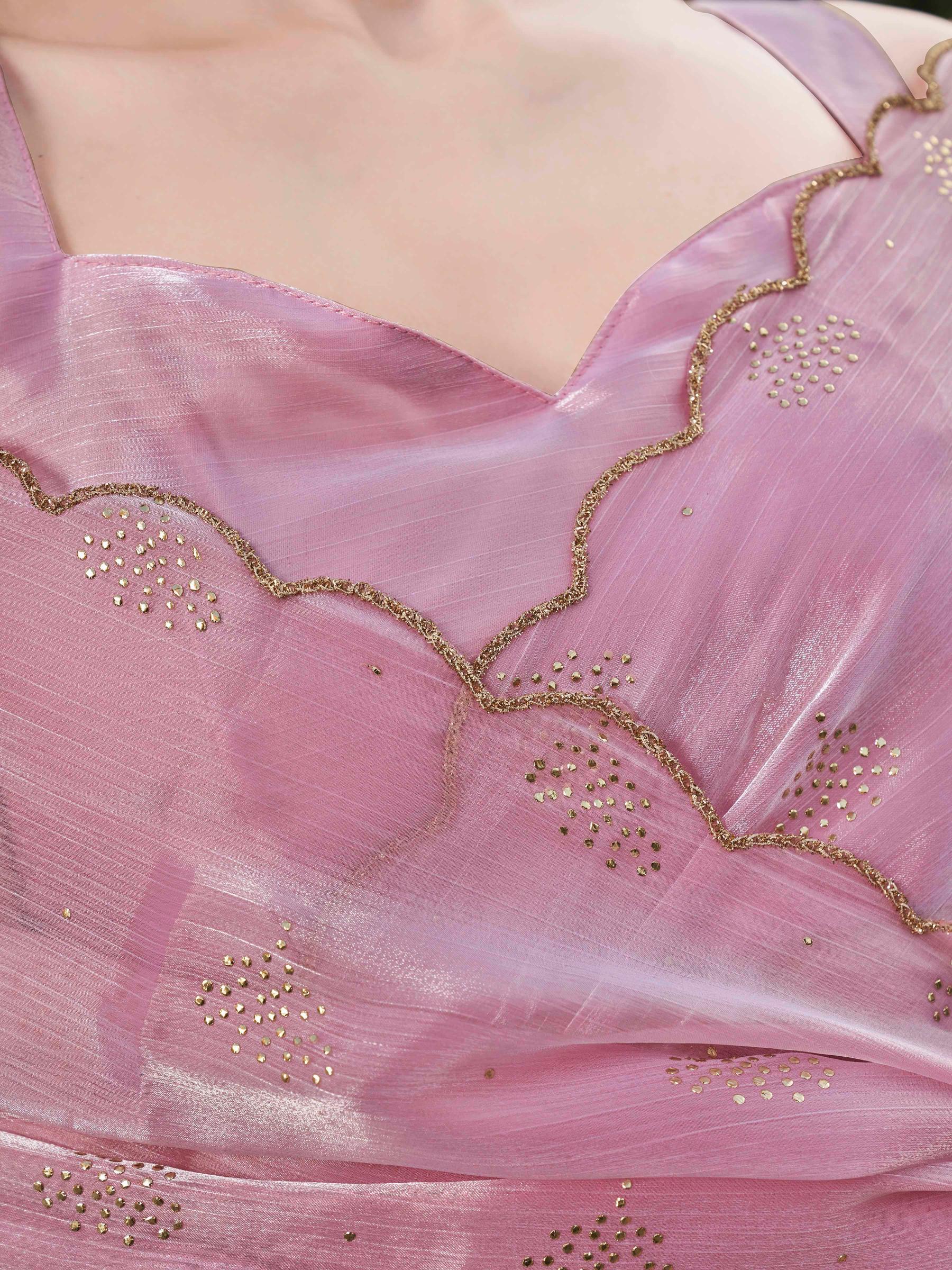Pink colored jimy cho saree with mukaish work and scalloped border