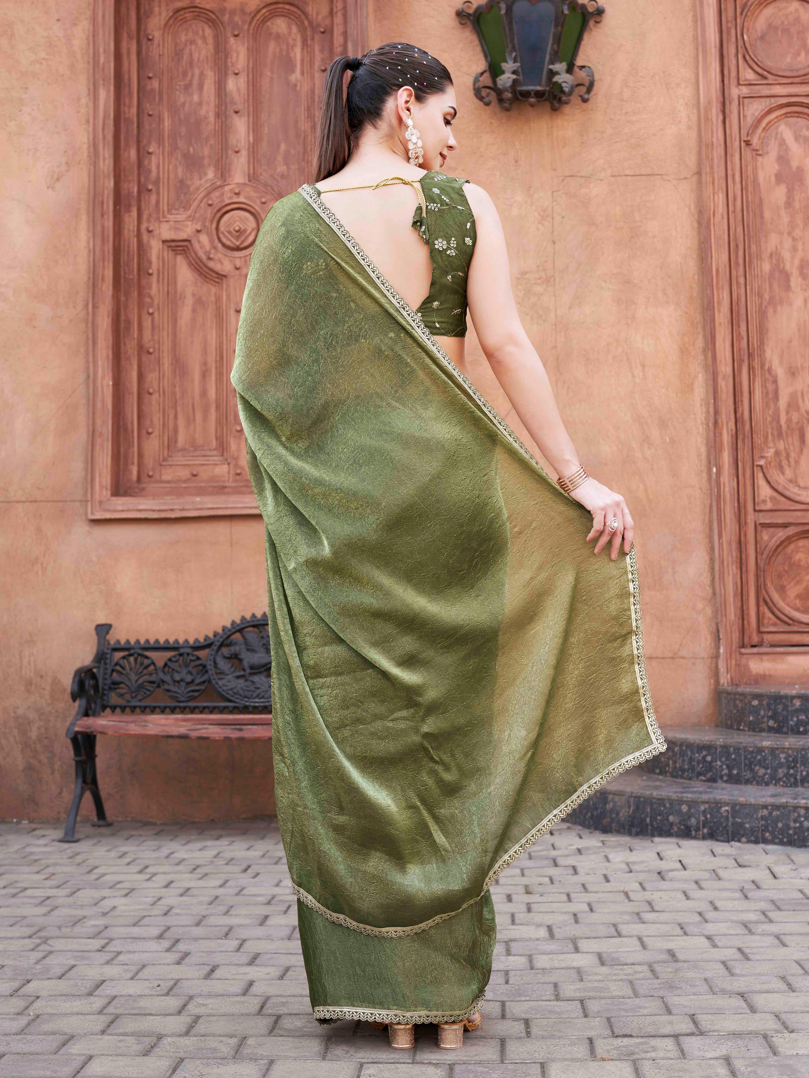 Two toned green and gold colored wrinkled saree with embroidered blouse and embellished lace