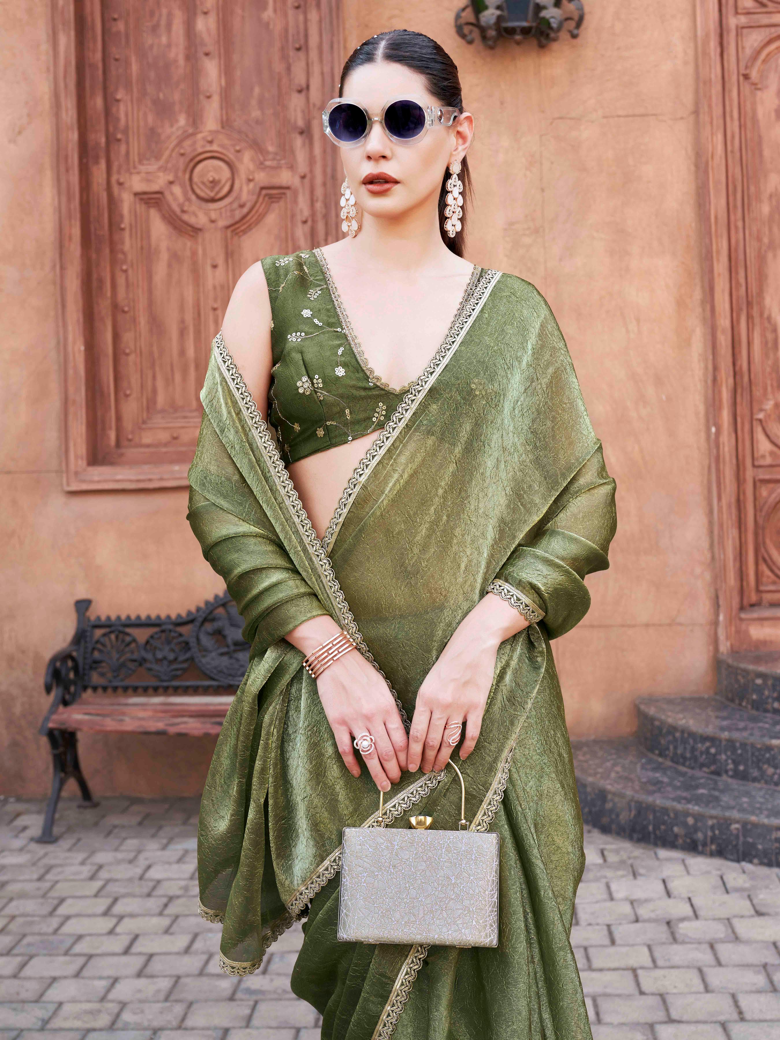 Two toned green and gold colored wrinkled saree with embroidered blouse and embellished lace