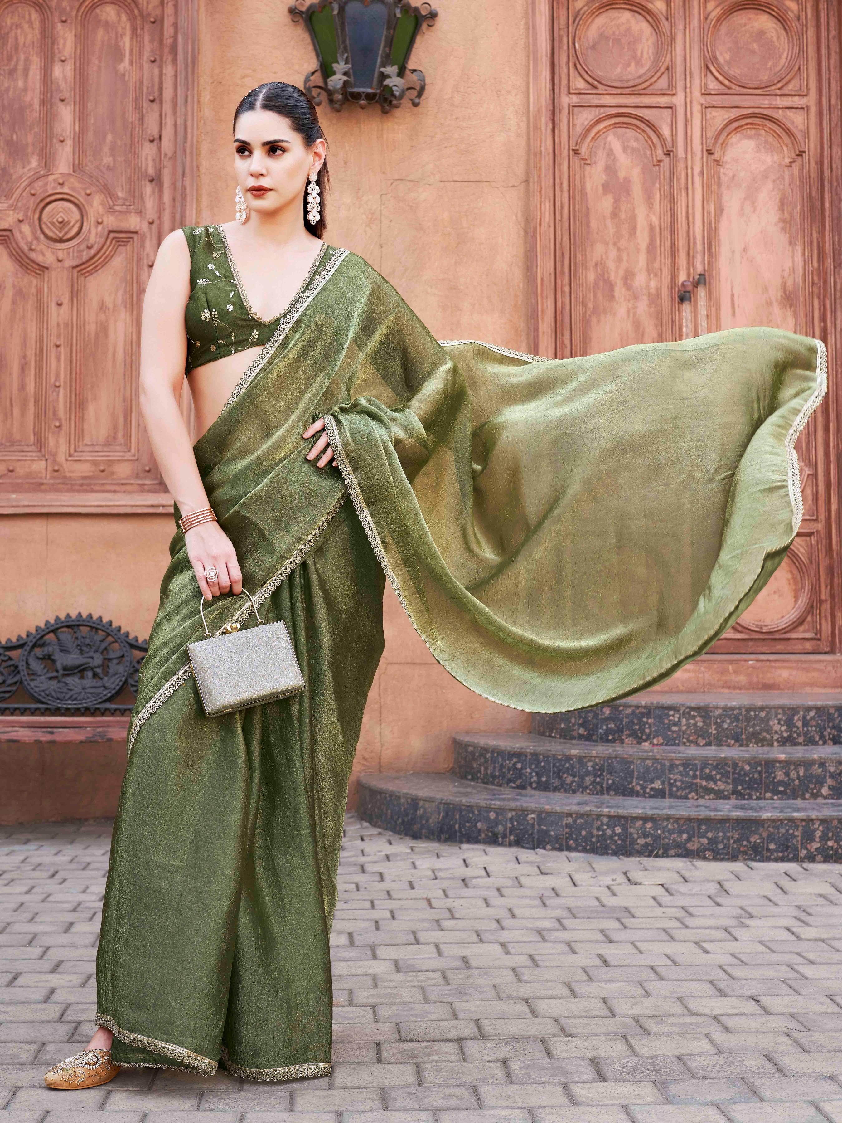 Two toned green and gold colored wrinkled saree with embroidered blouse and embellished lace