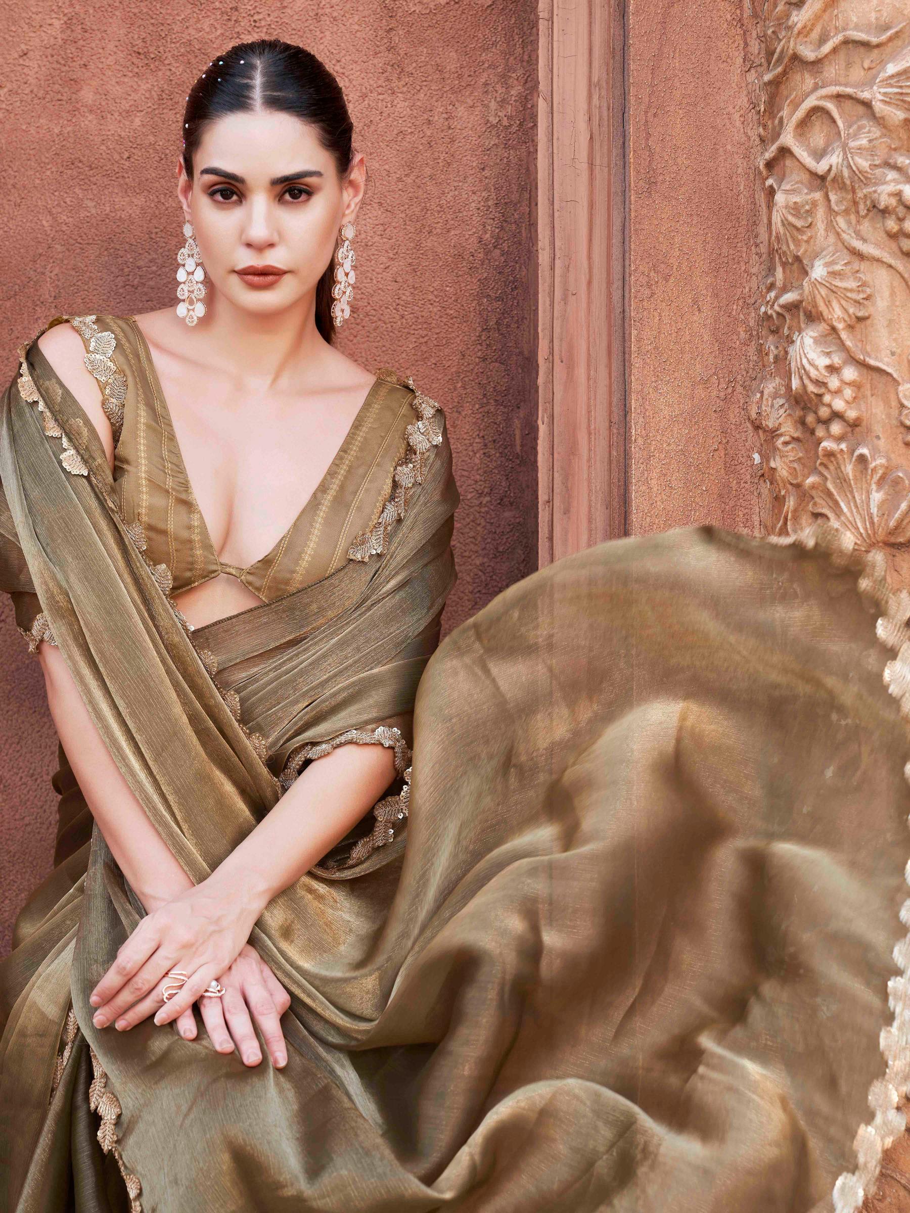 Two toned olive green and gold colored jimmy choo saree with brocade blouse and embroidered lace