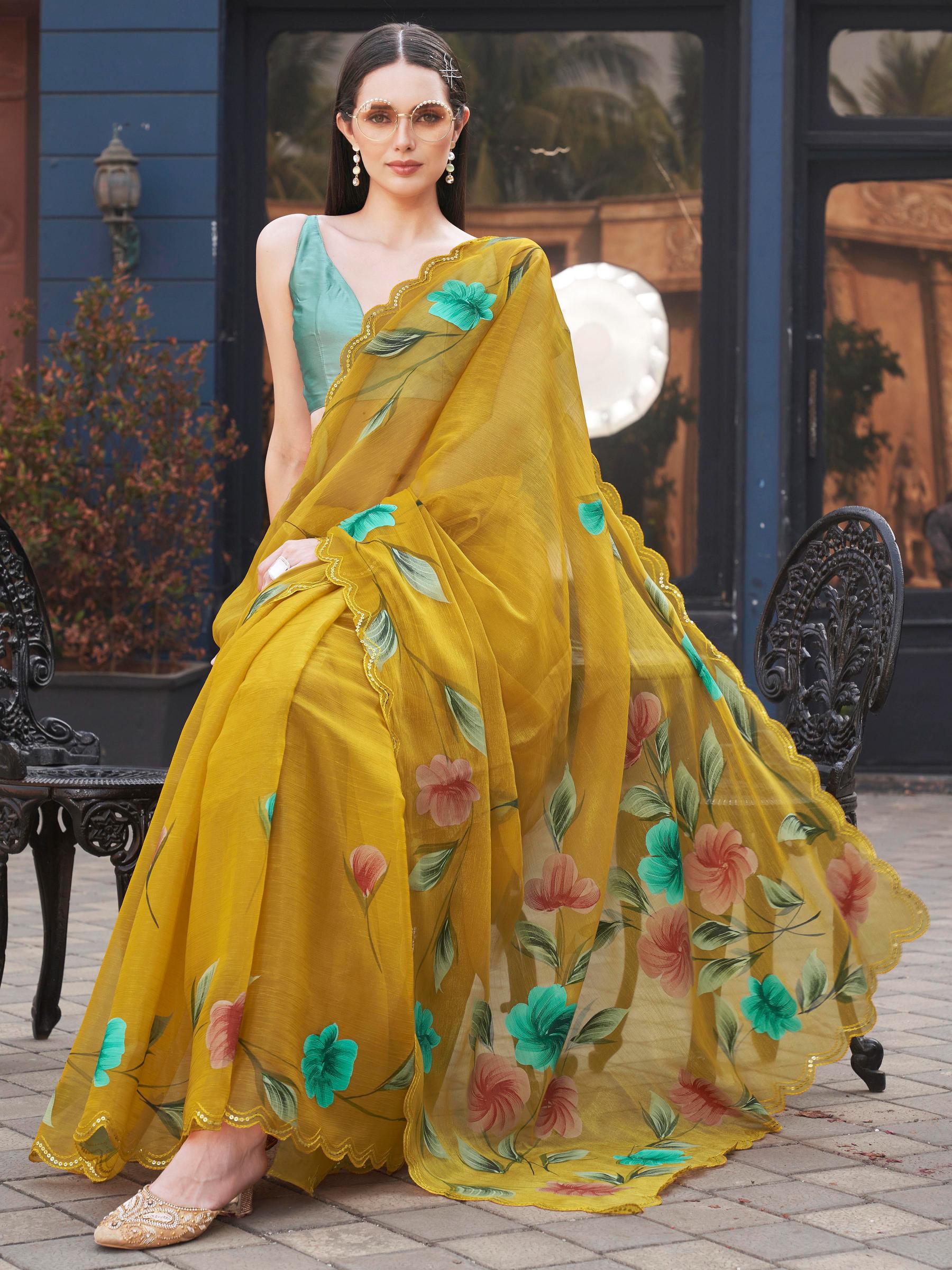Yellow colored designer floral hand print jimmy choo saree with scalloped border