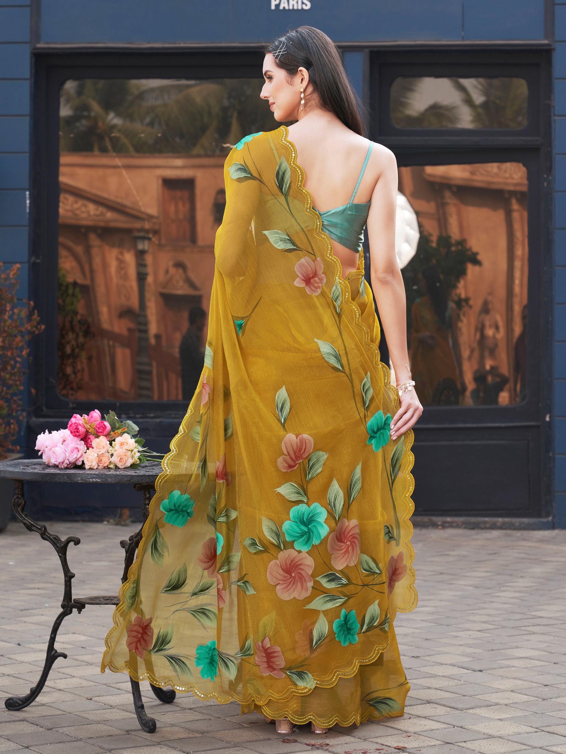 Yellow colored designer floral hand print jimmy choo saree with scalloped border