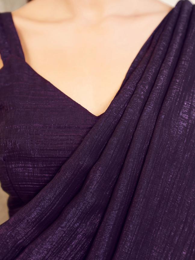 Ready to wear purple colored shimmer saree with tassles on pallu