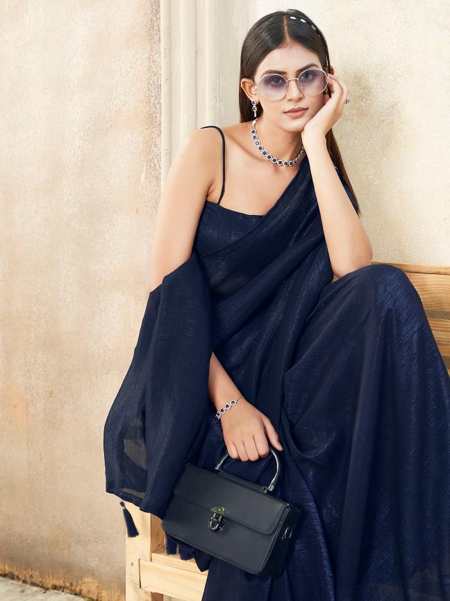 Ready to wear navy blue colored shimmer saree with tassles on pallu
