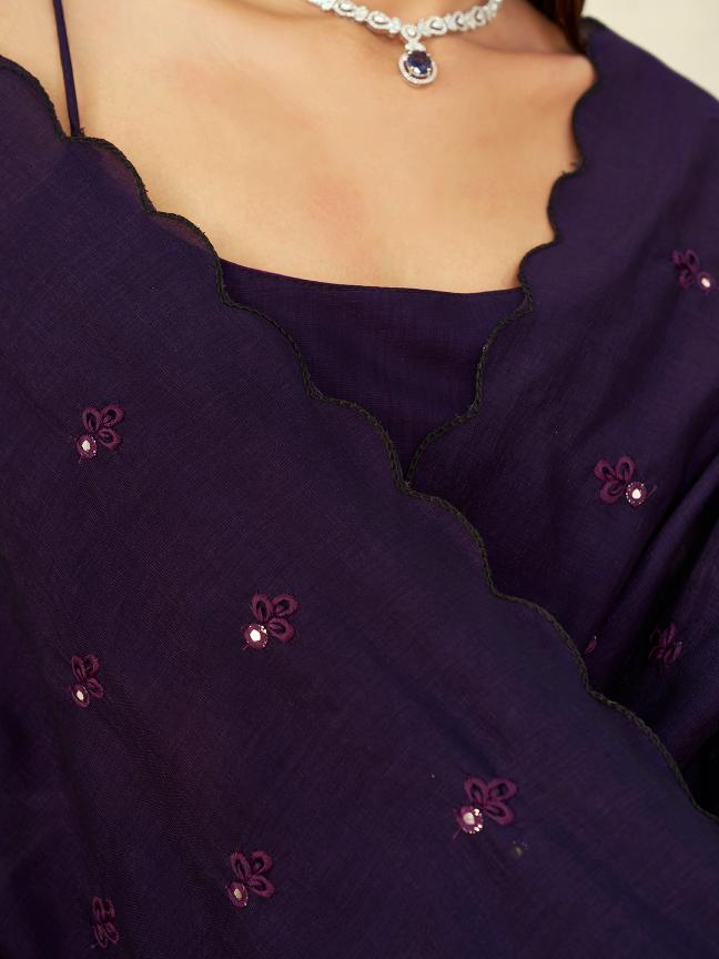 purple colored saree with mirror embroidery on pallu and scalloped border