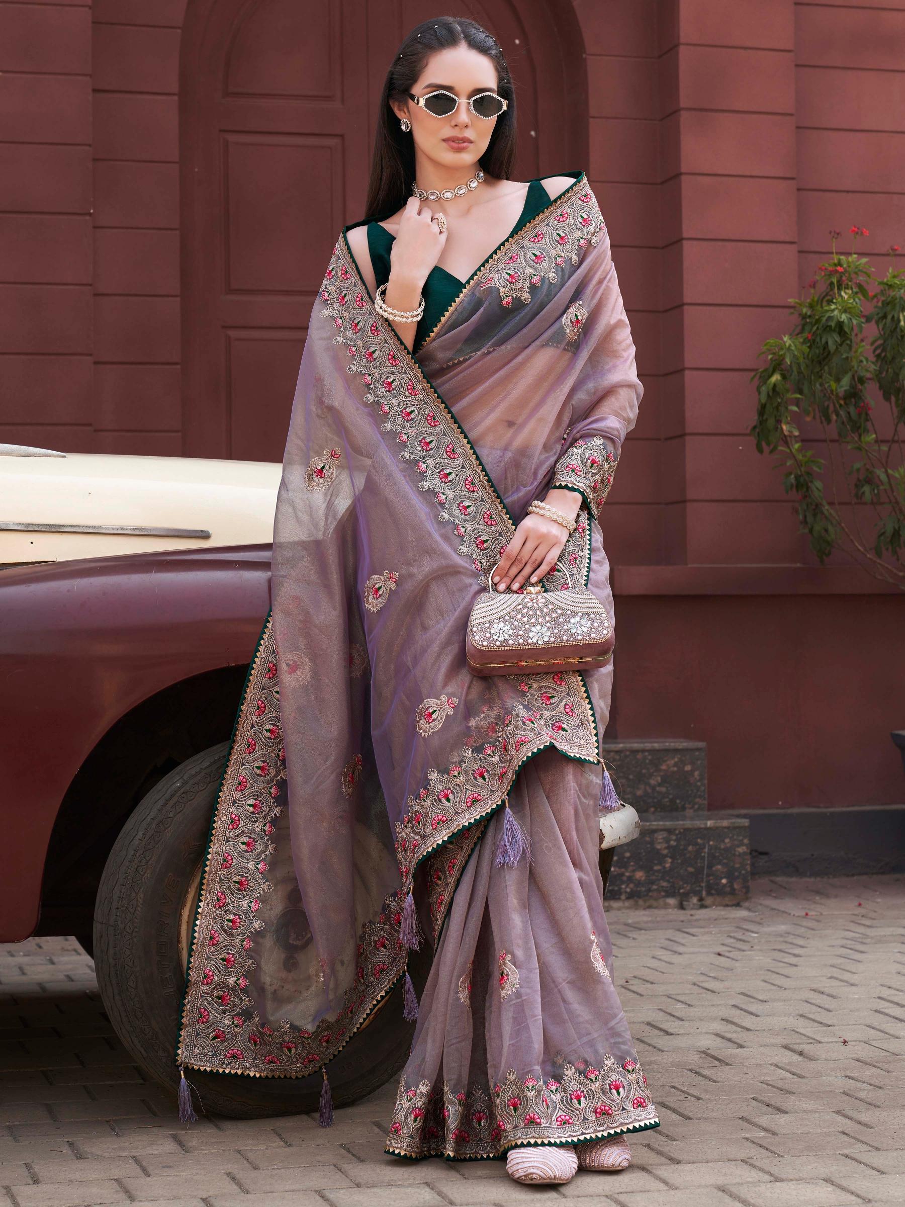Mauve colored shimmer net embroidered saree