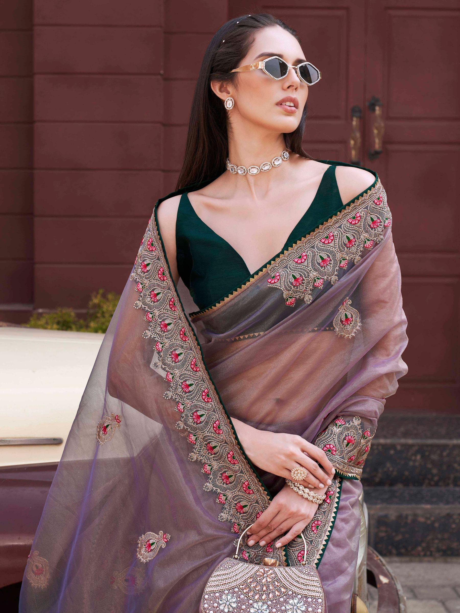 Mauve colored shimmer net embroidered saree