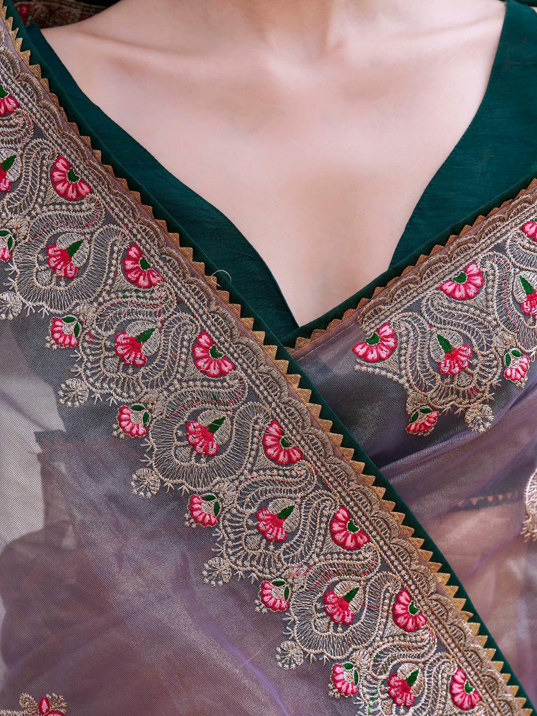 Mauve colored shimmer net embroidered saree