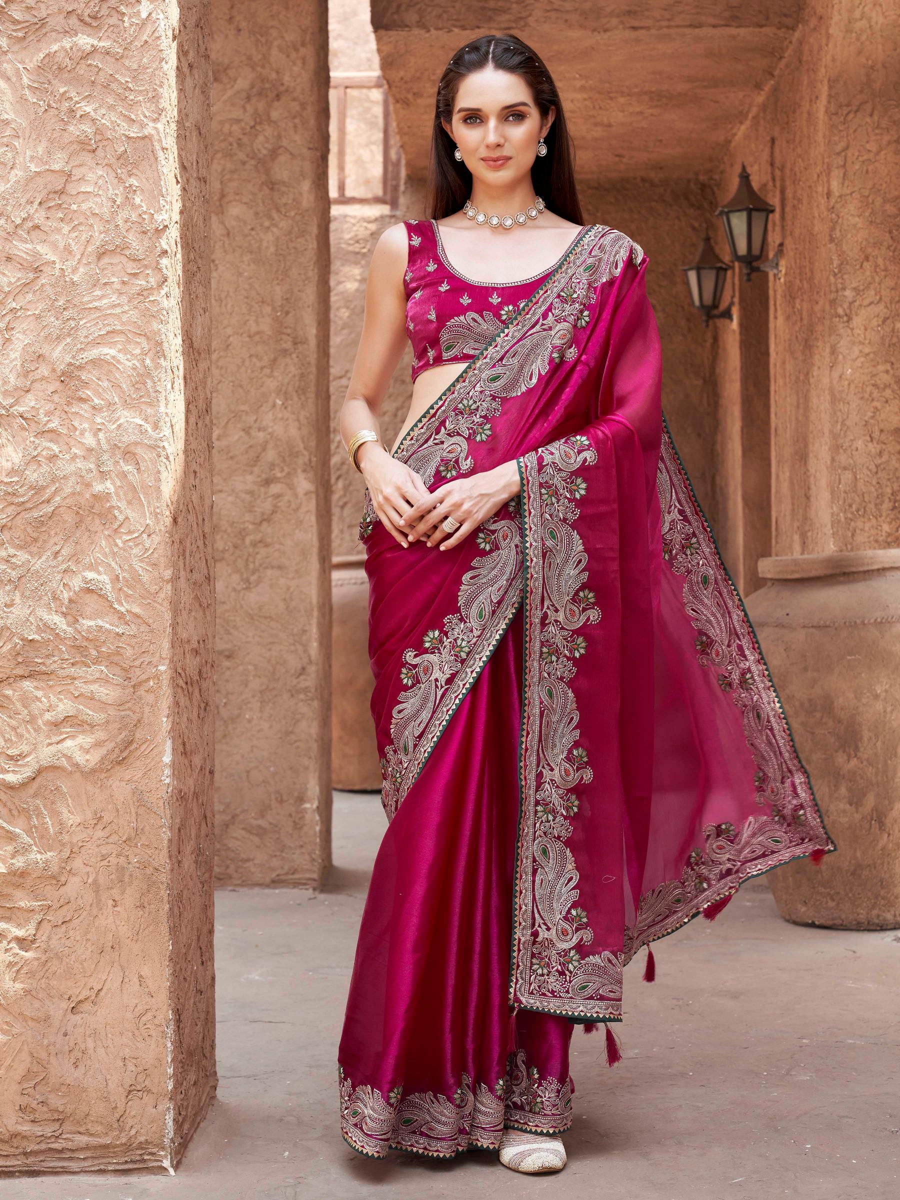 rani colored zari embroidered saree