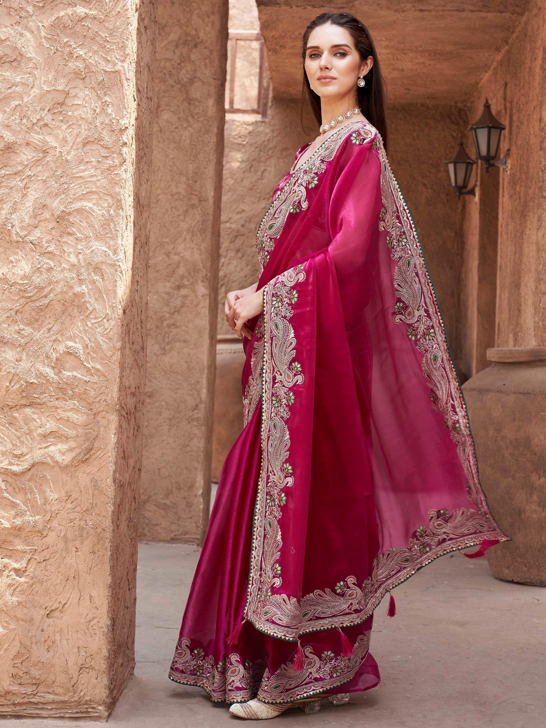rani colored zari embroidered saree