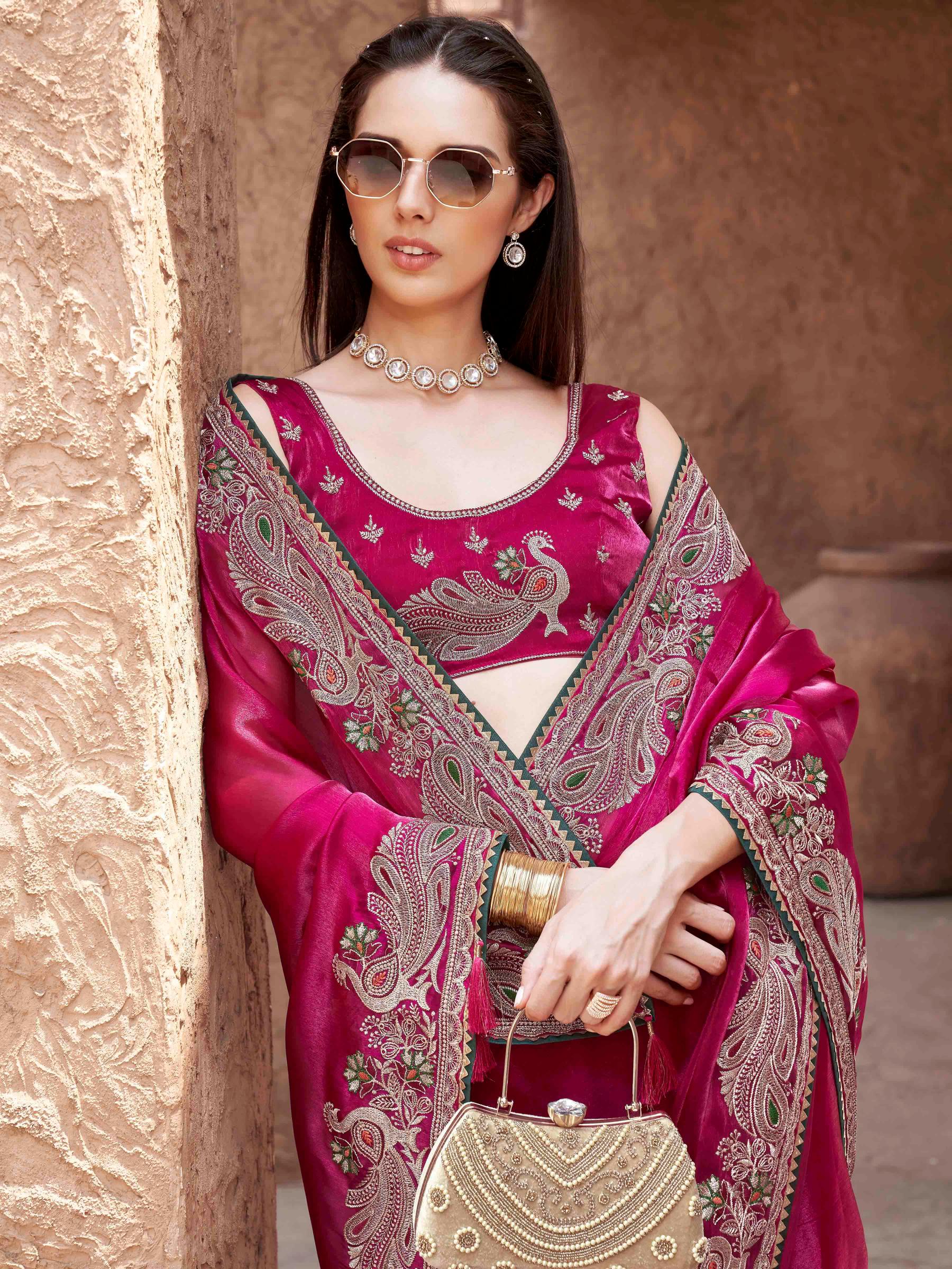rani colored zari embroidered saree