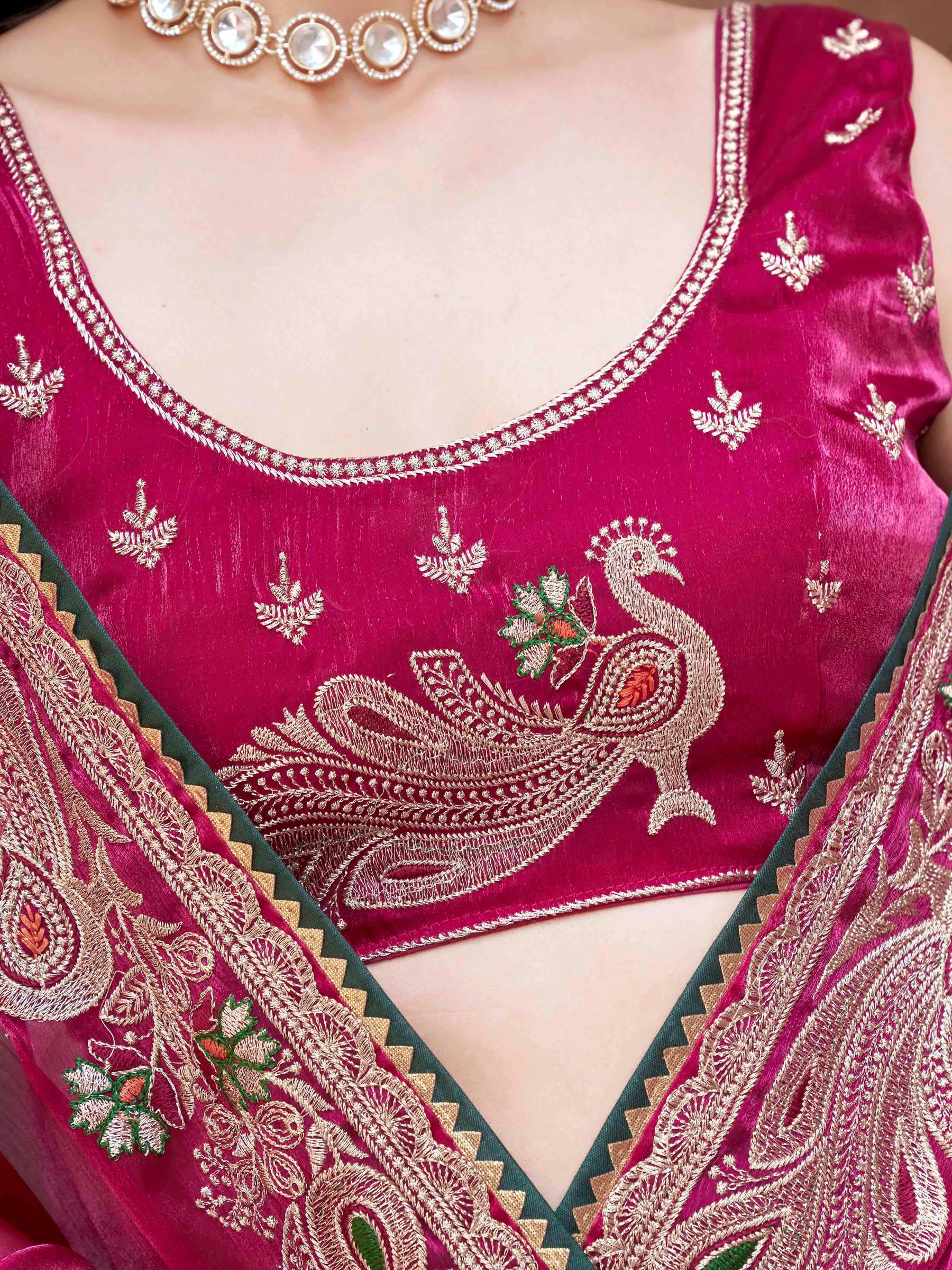 rani colored zari embroidered saree