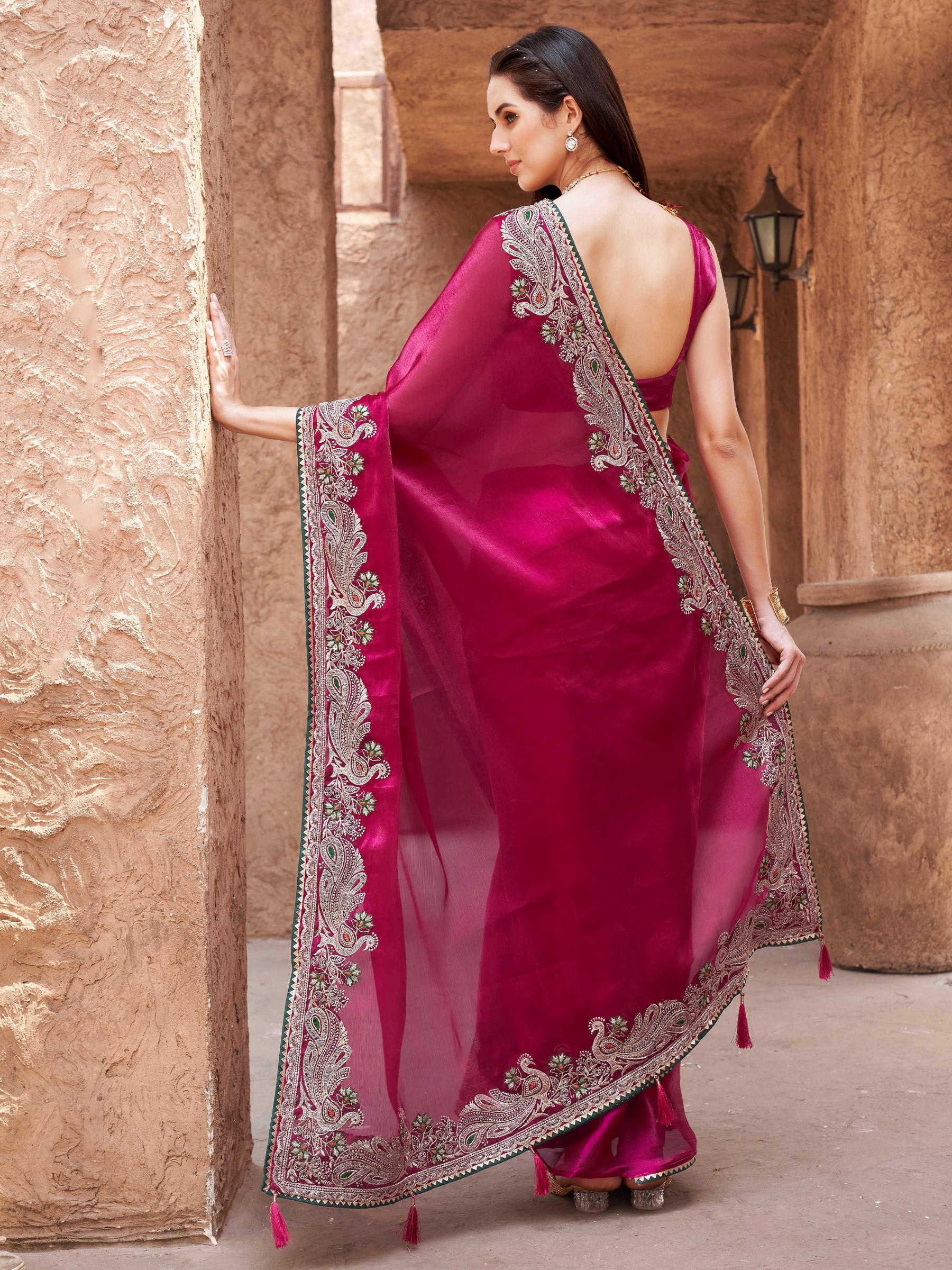 rani colored zari embroidered saree
