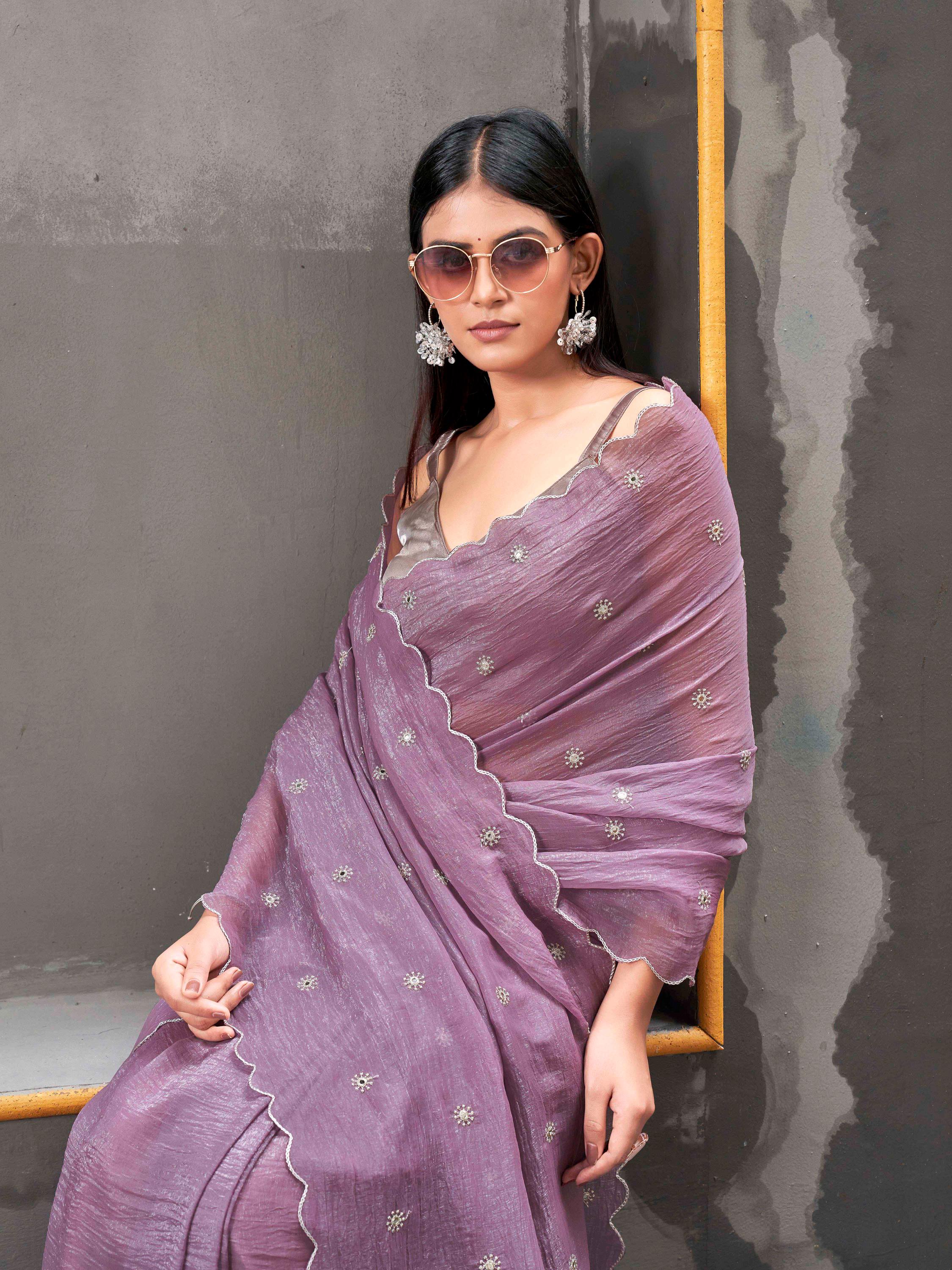 Mauve colored crunchy saree with mirror embroidery on pallu and scalloped border