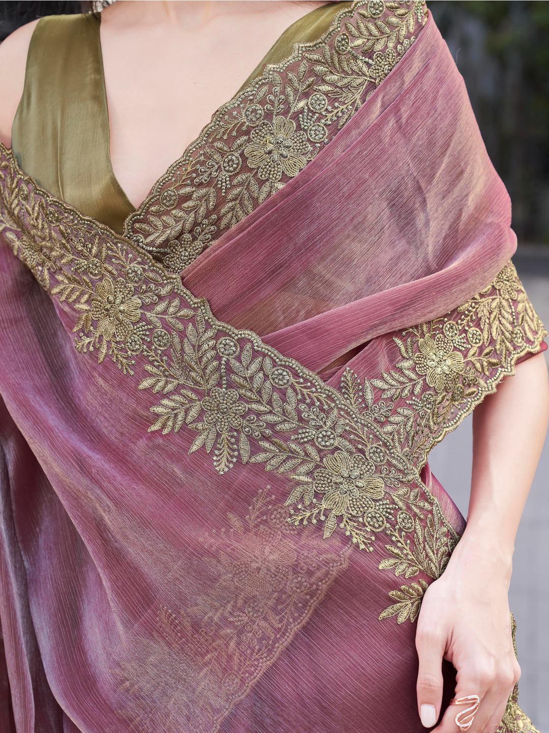 Pink colored zari embroidered saree