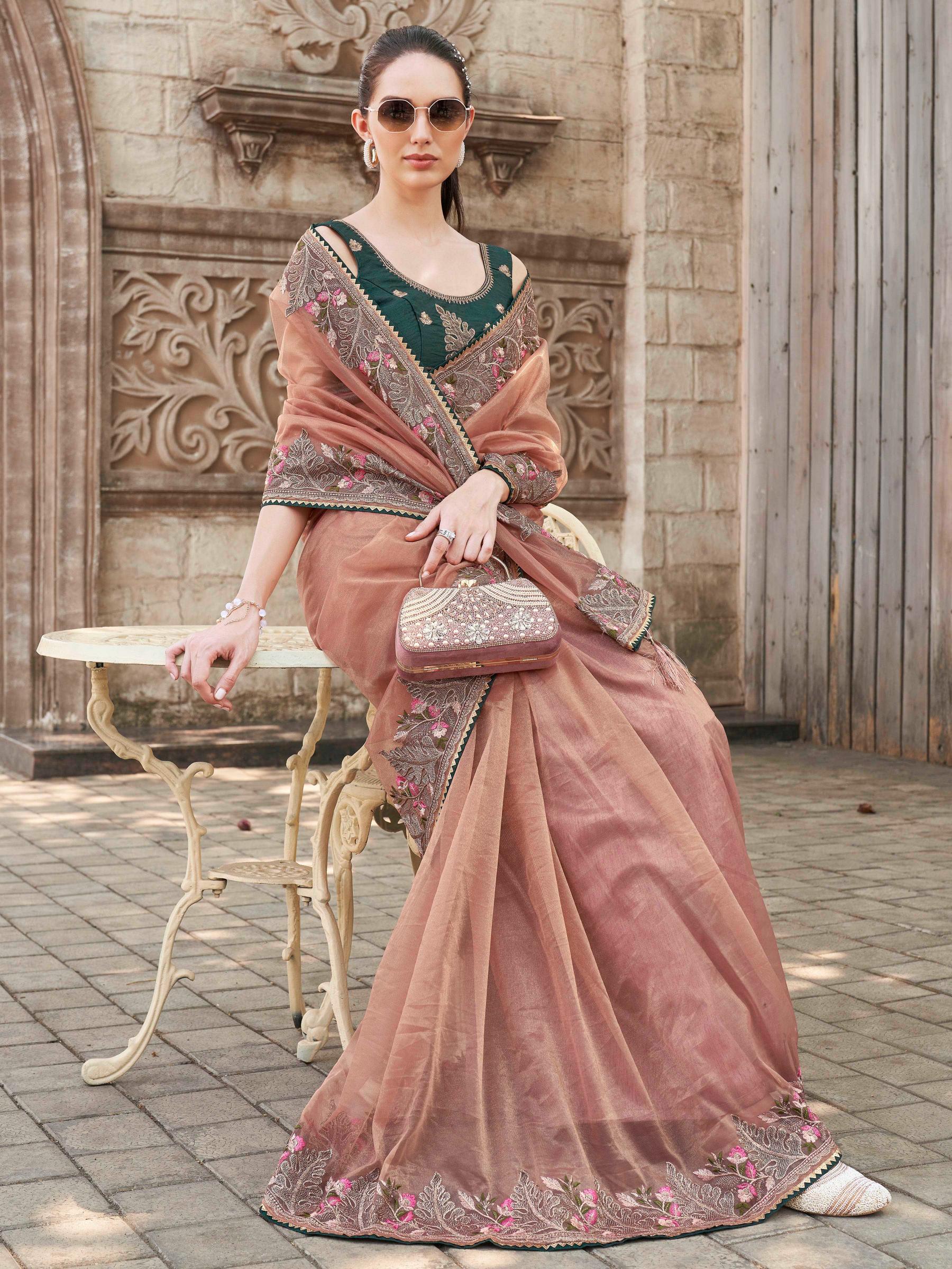 peach colored designer shimmer net embroidered saree