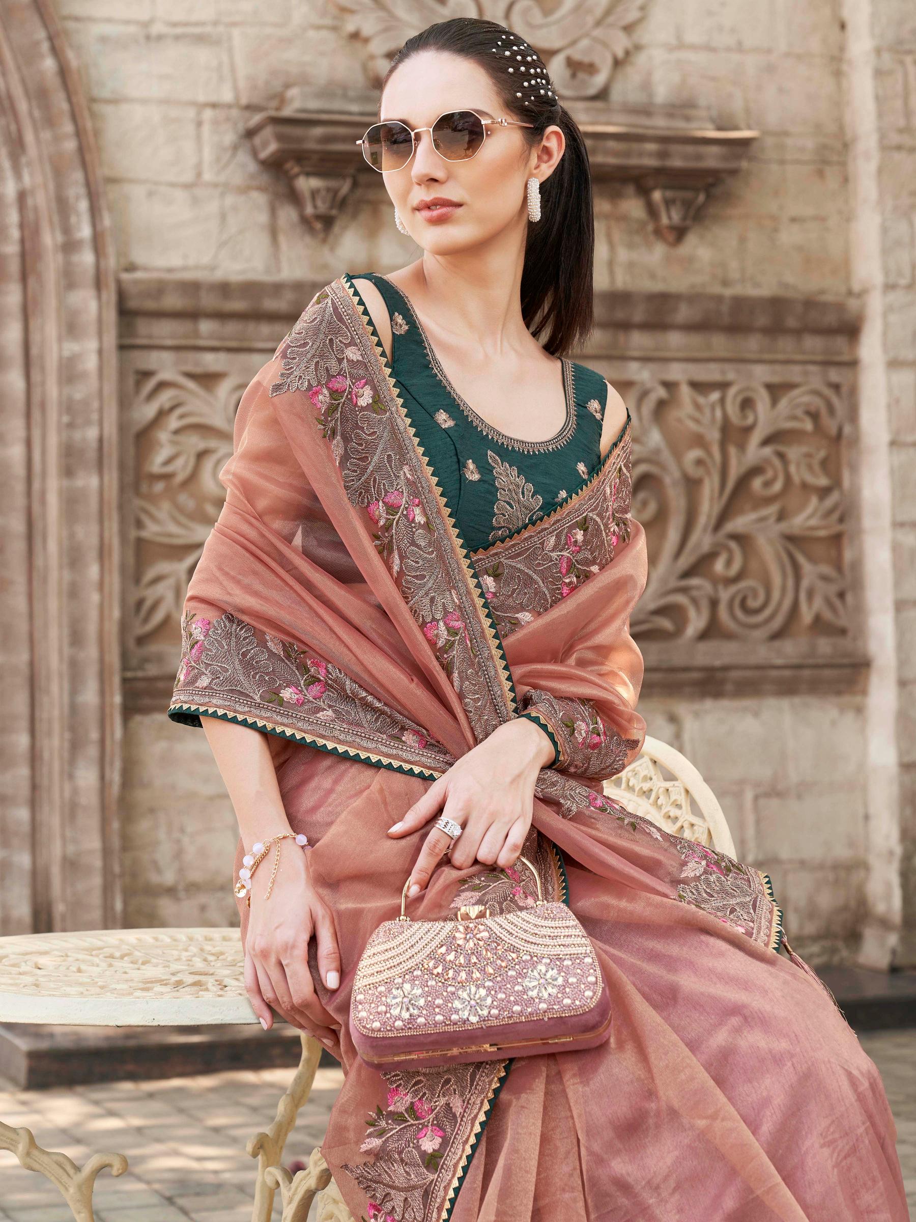 peach colored designer shimmer net embroidered saree
