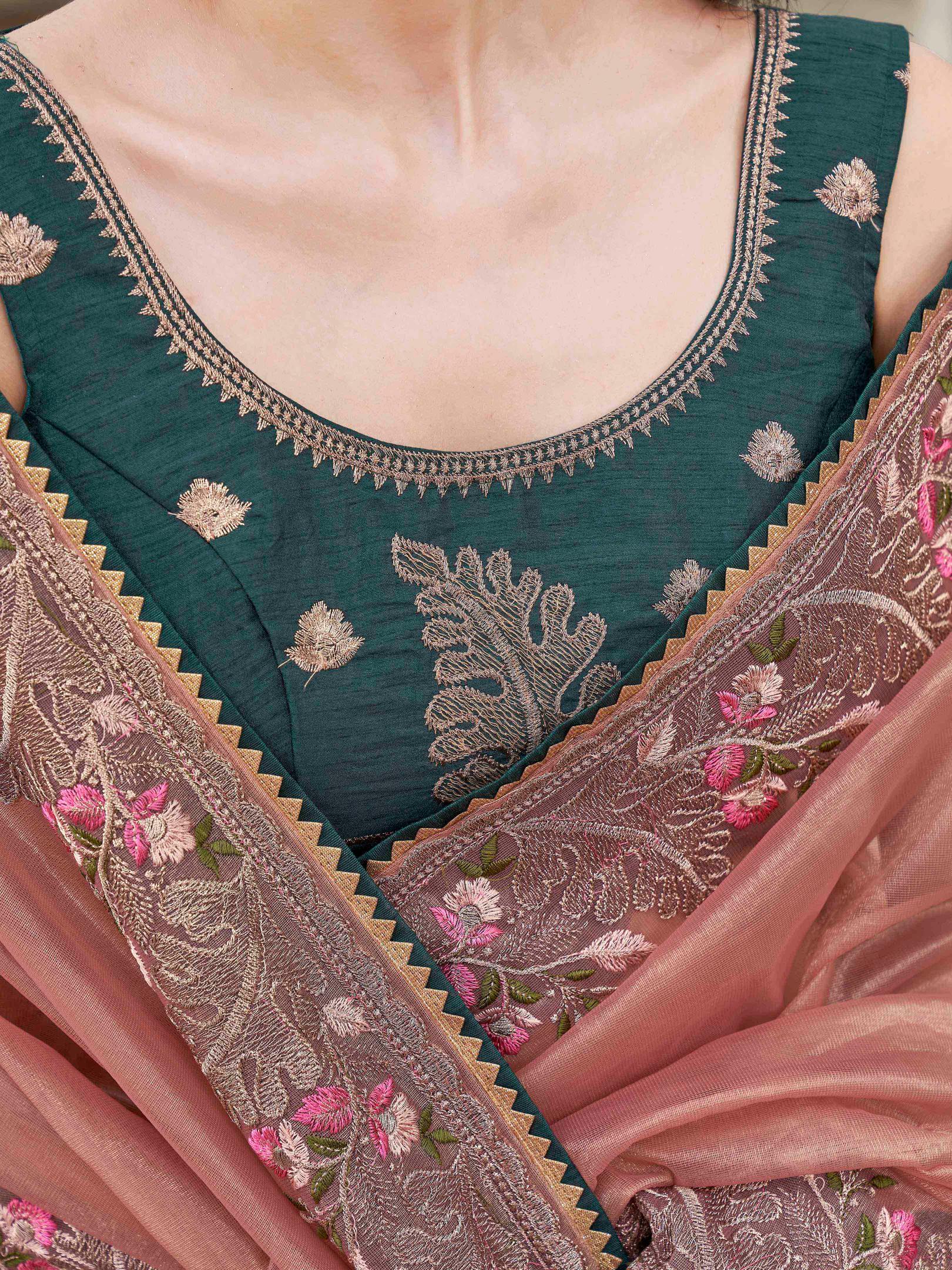 peach colored designer shimmer net embroidered saree