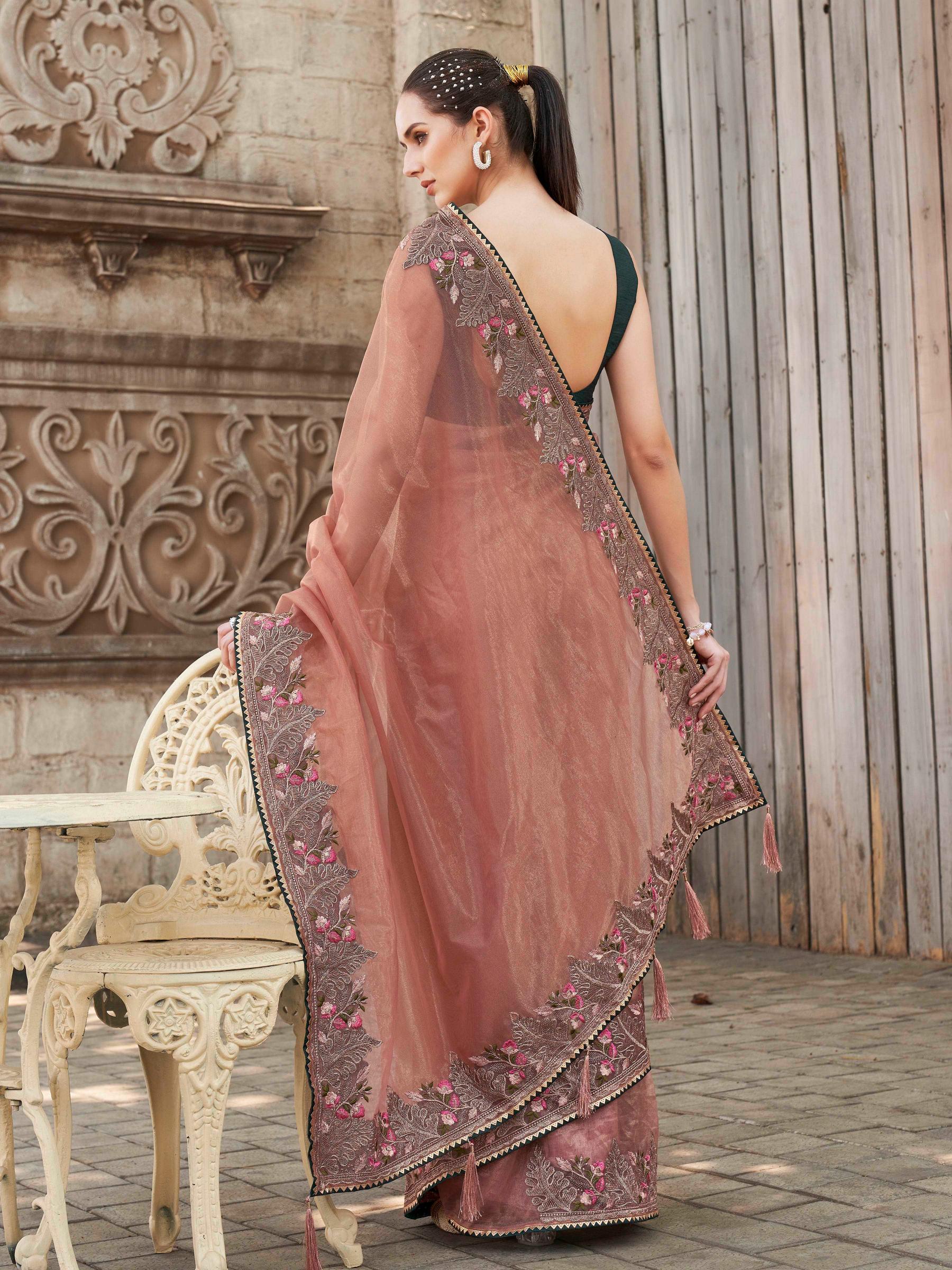 peach colored designer shimmer net embroidered saree
