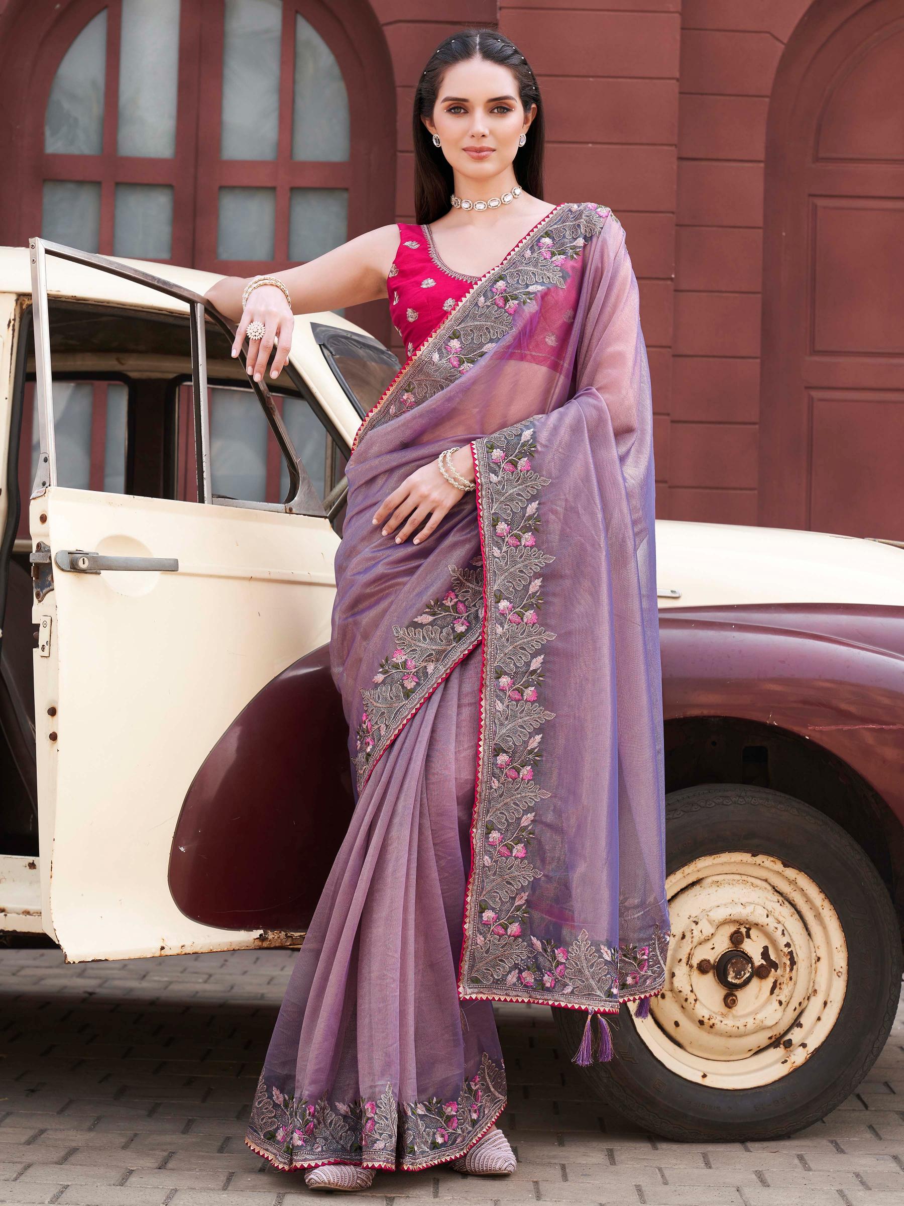 purple colored designer shimmer net embroidered saree