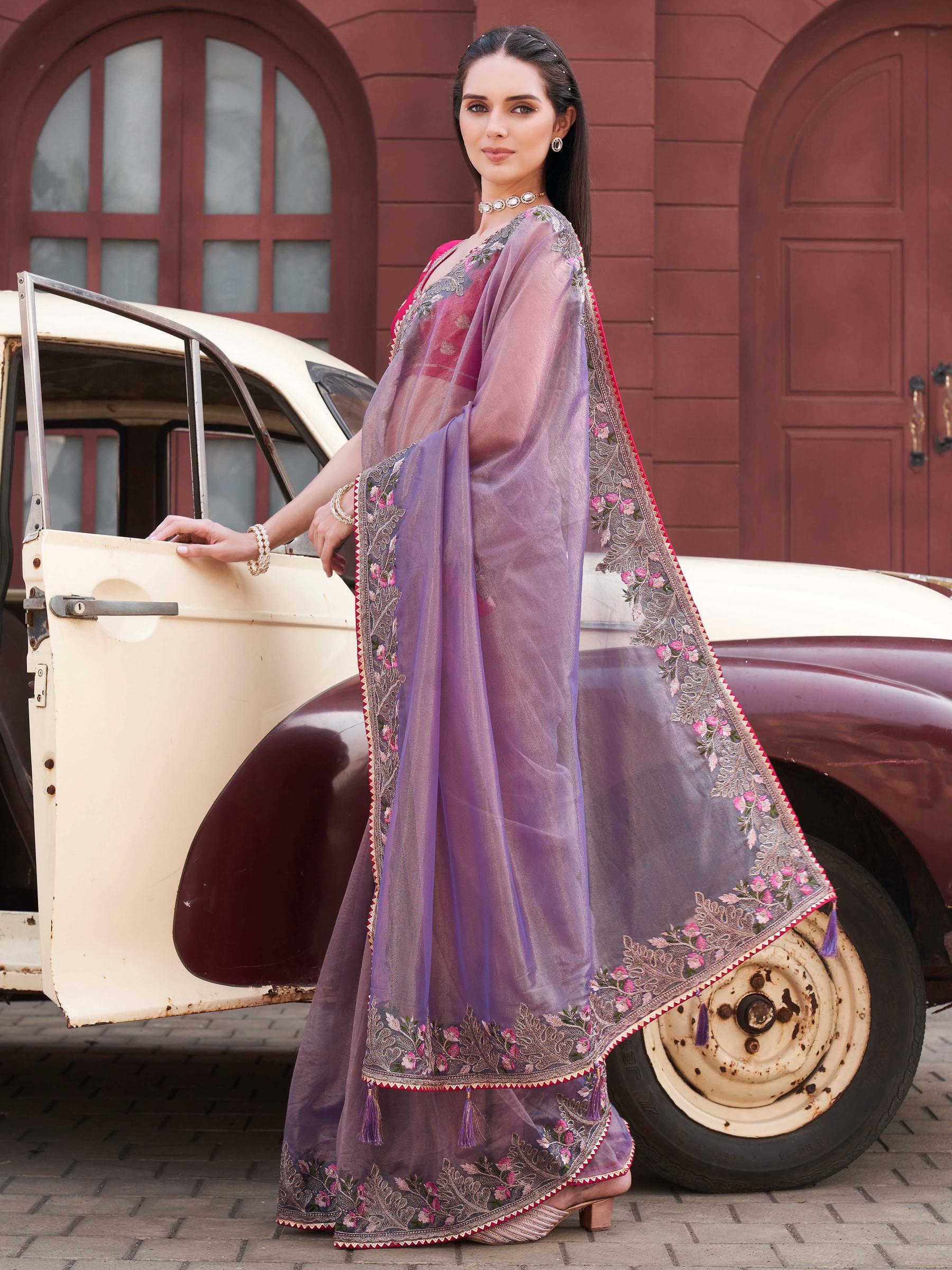 purple colored designer shimmer net embroidered saree