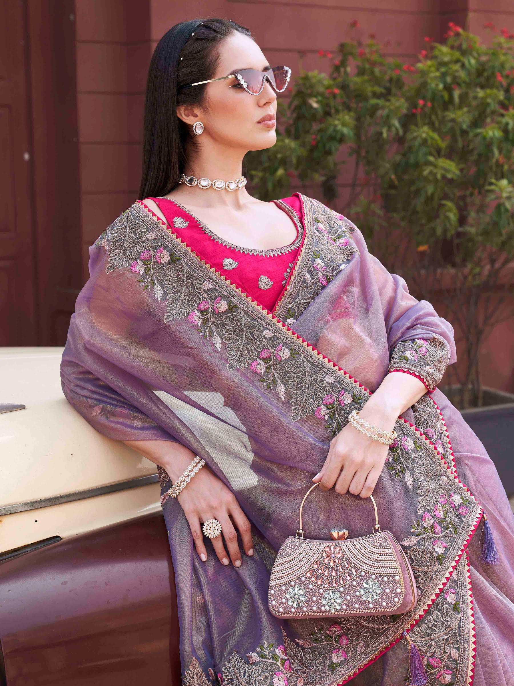 purple colored designer shimmer net embroidered saree