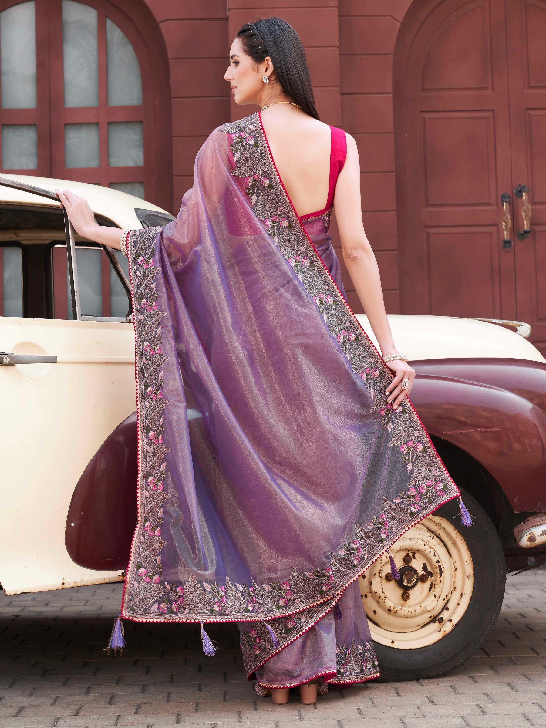 purple colored designer shimmer net embroidered saree
