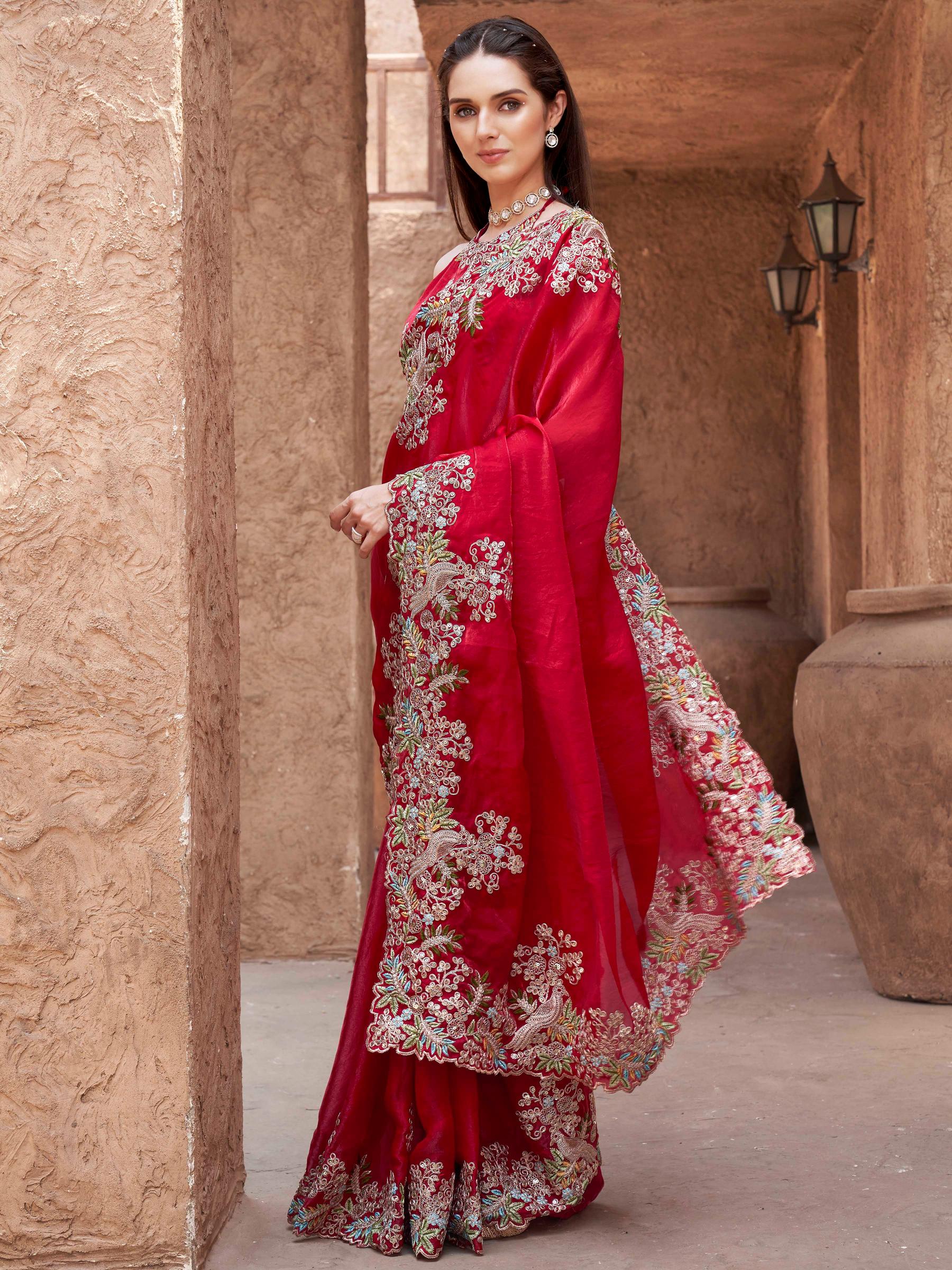red colored designer jimmy choo saree with sequinned embroidery border