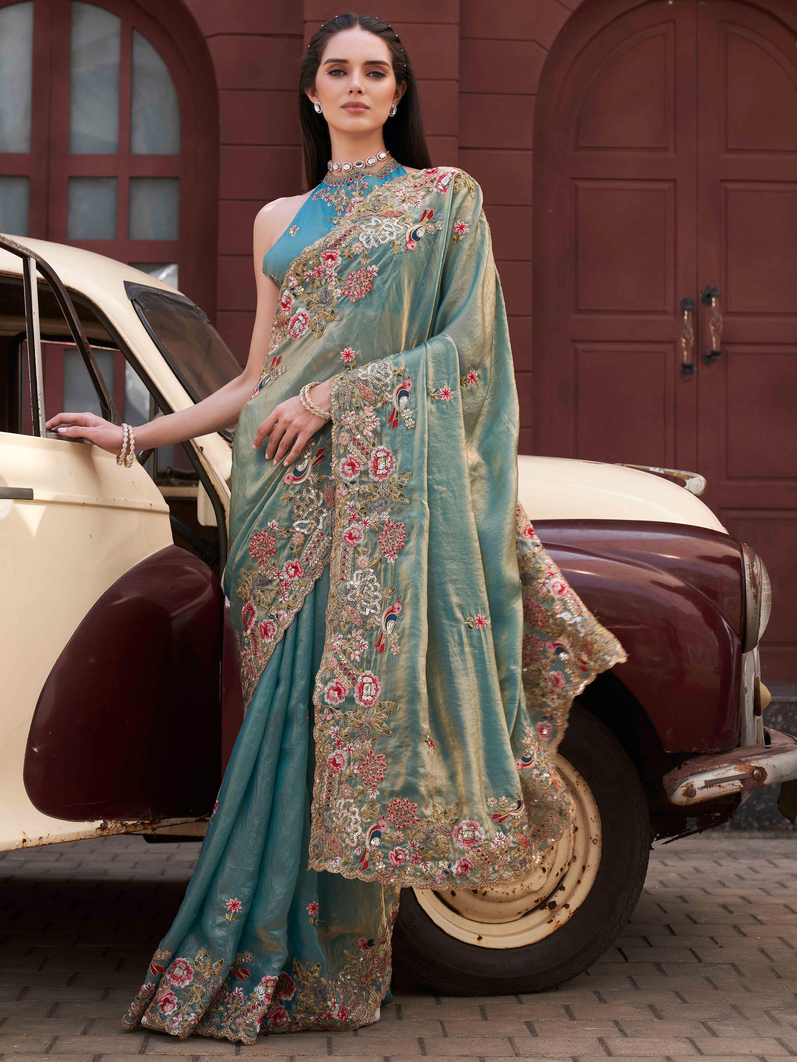 Two tone blue and gold colored jimmy choo saree with sequinned embroidery border