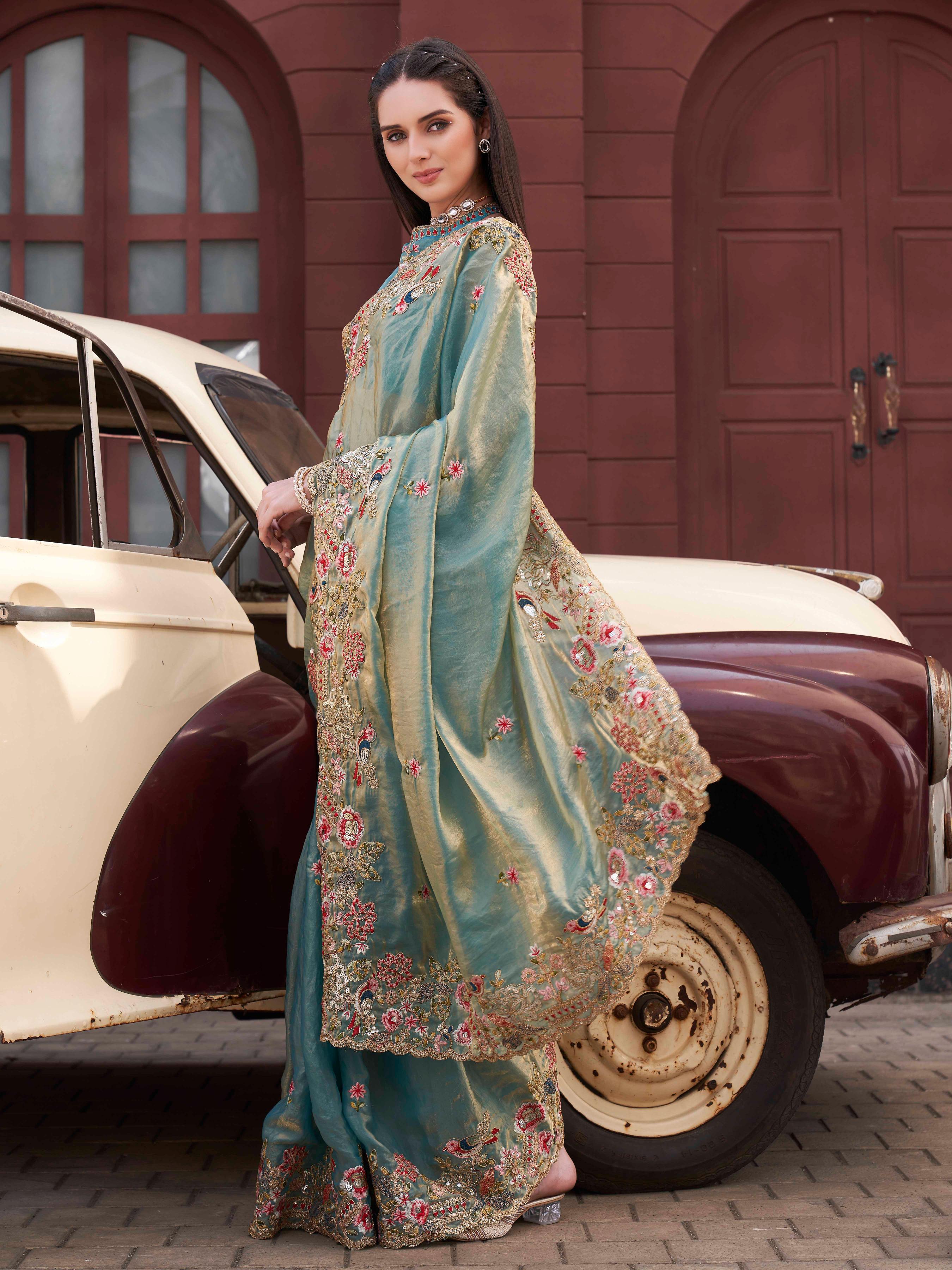 Two tone blue and gold colored jimmy choo saree with sequinned embroidery border